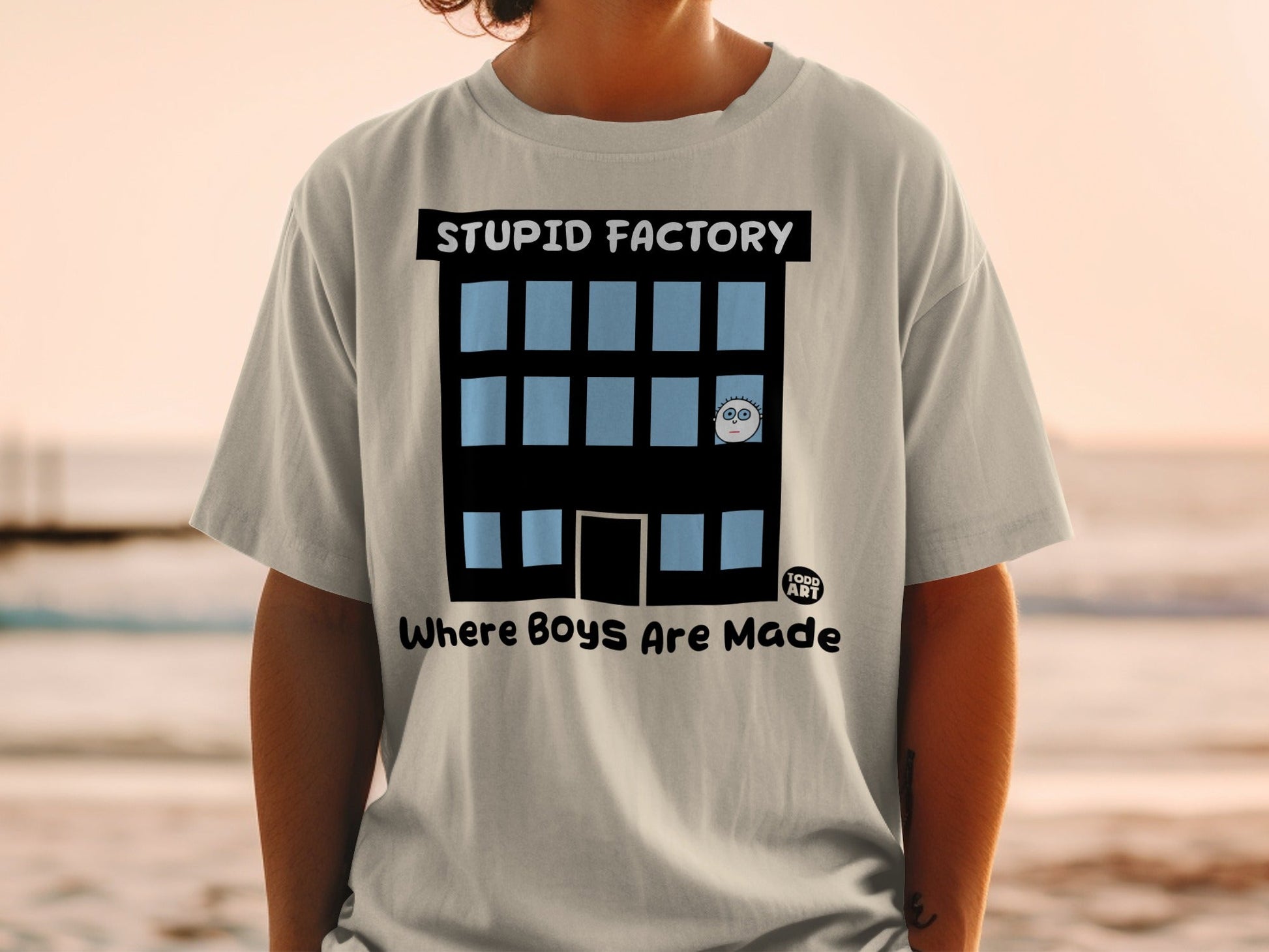 Stupid Factory Where Boys Are Made Graphic T-Shirt