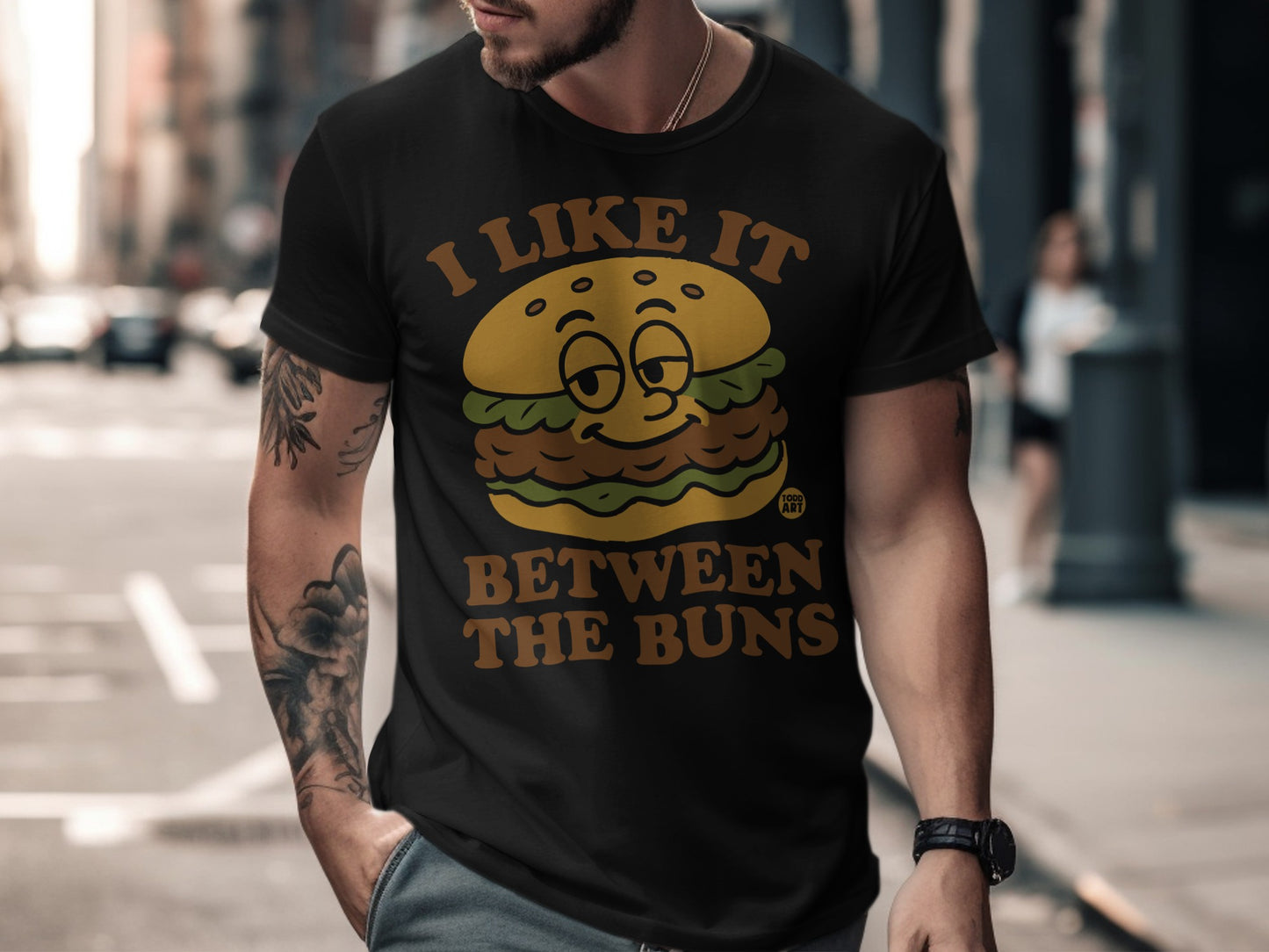 I Like It Between The Buns Funny Burger Graphic Tee