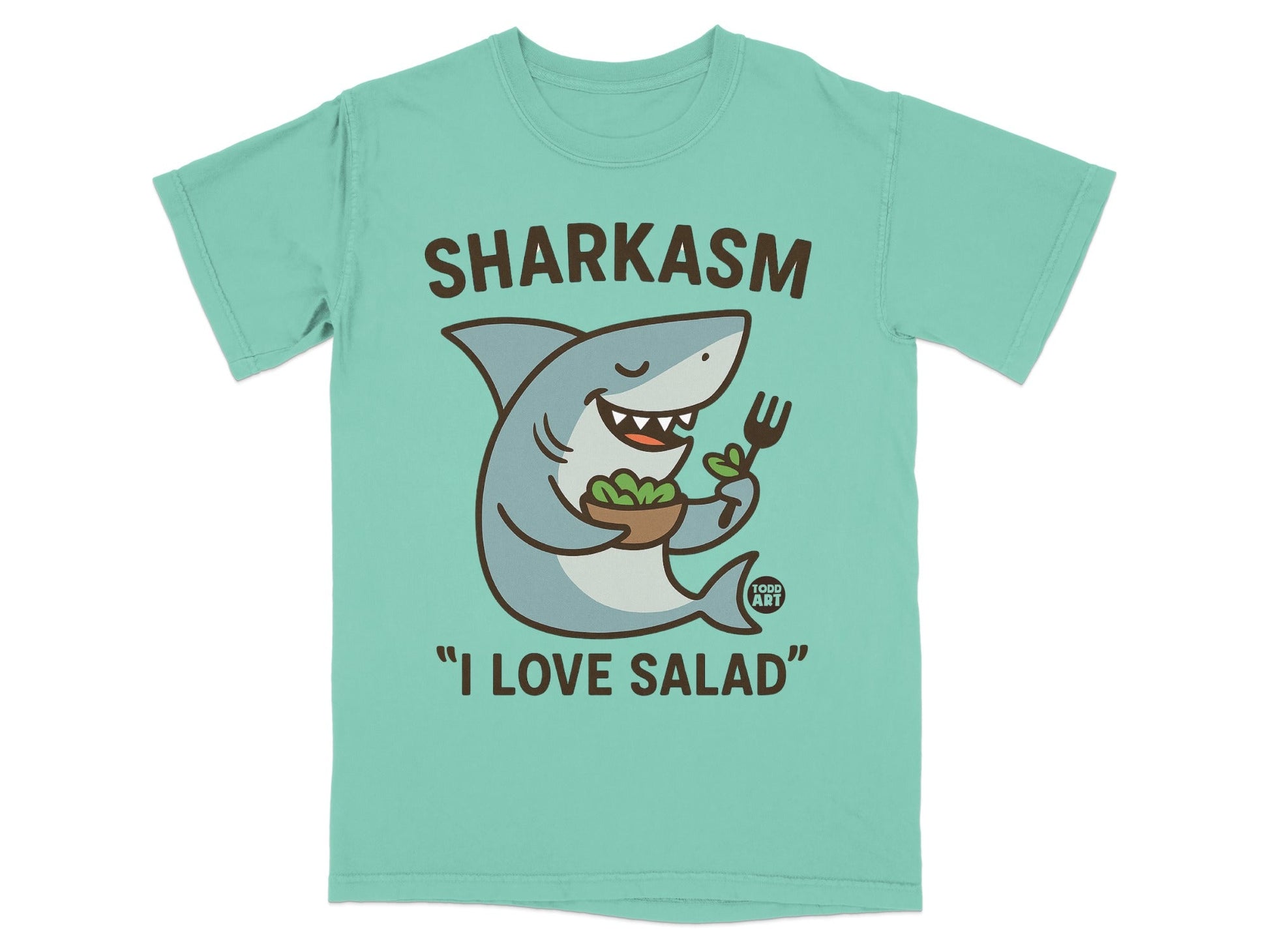 Shark wearing a t-shirt that says "Sharkasm" and "I Love Salad".