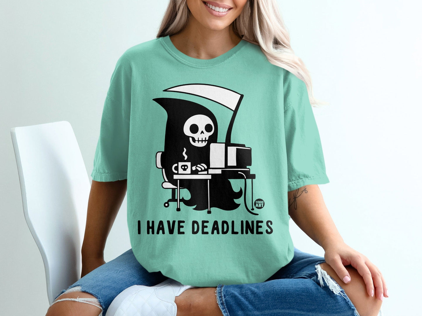 Grim Reaper at a computer with a coffee cup, "I HAVE DEADLINES" text.