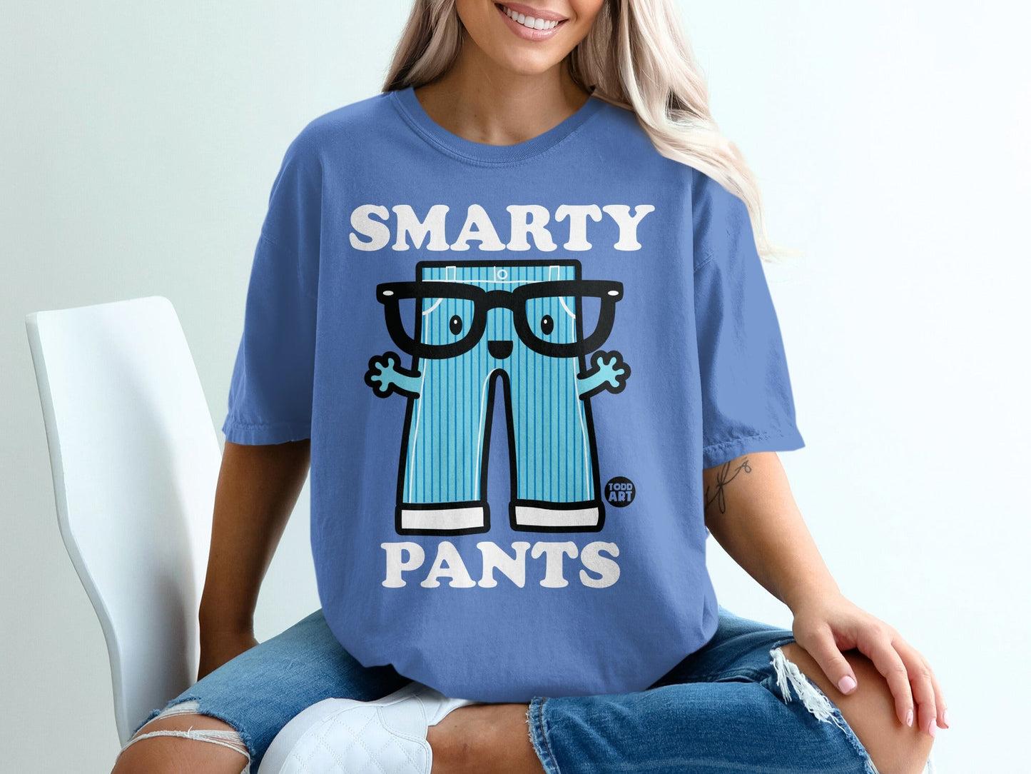 Blue t-shirt with cartoon pants wearing glasses and text "SMARTY PANTS".