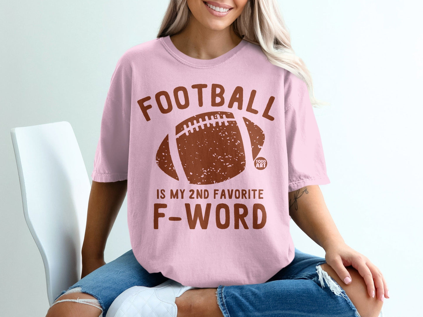 Pink t-shirt with "FOOTBALL IS MY 2ND FAVORITE F-WORD" and a football graphic.