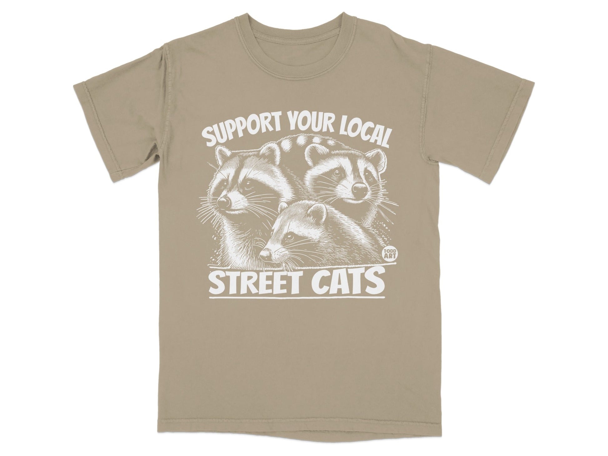 T-shirt with three raccoons and "SUPPORT YOUR LOCAL STREET CATS" text.