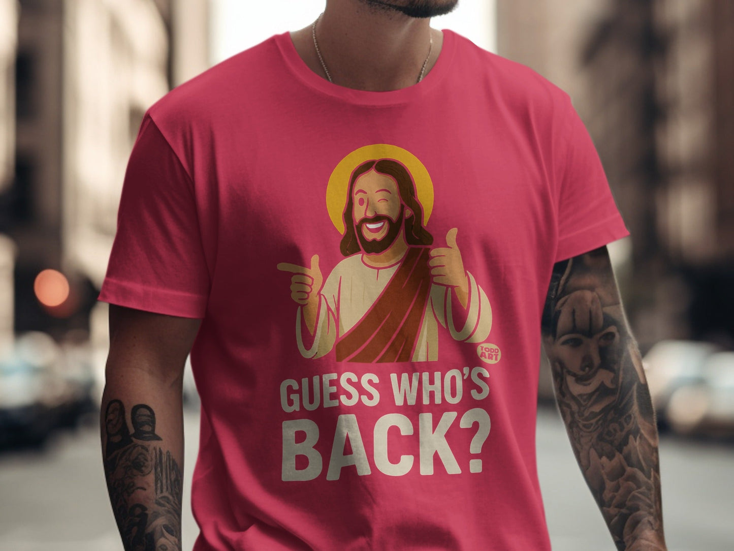 T-shirt with Jesus giving thumbs up and text "GUESS WHO'S BACK?"