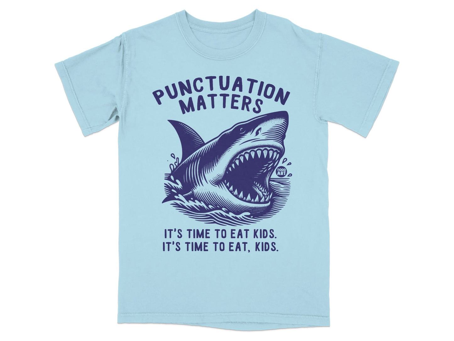 Light blue t-shirt with a dark blue shark and text "Punctuation Matters" and "It's Time to Eat Kids. It's Time to Eat, Kids."