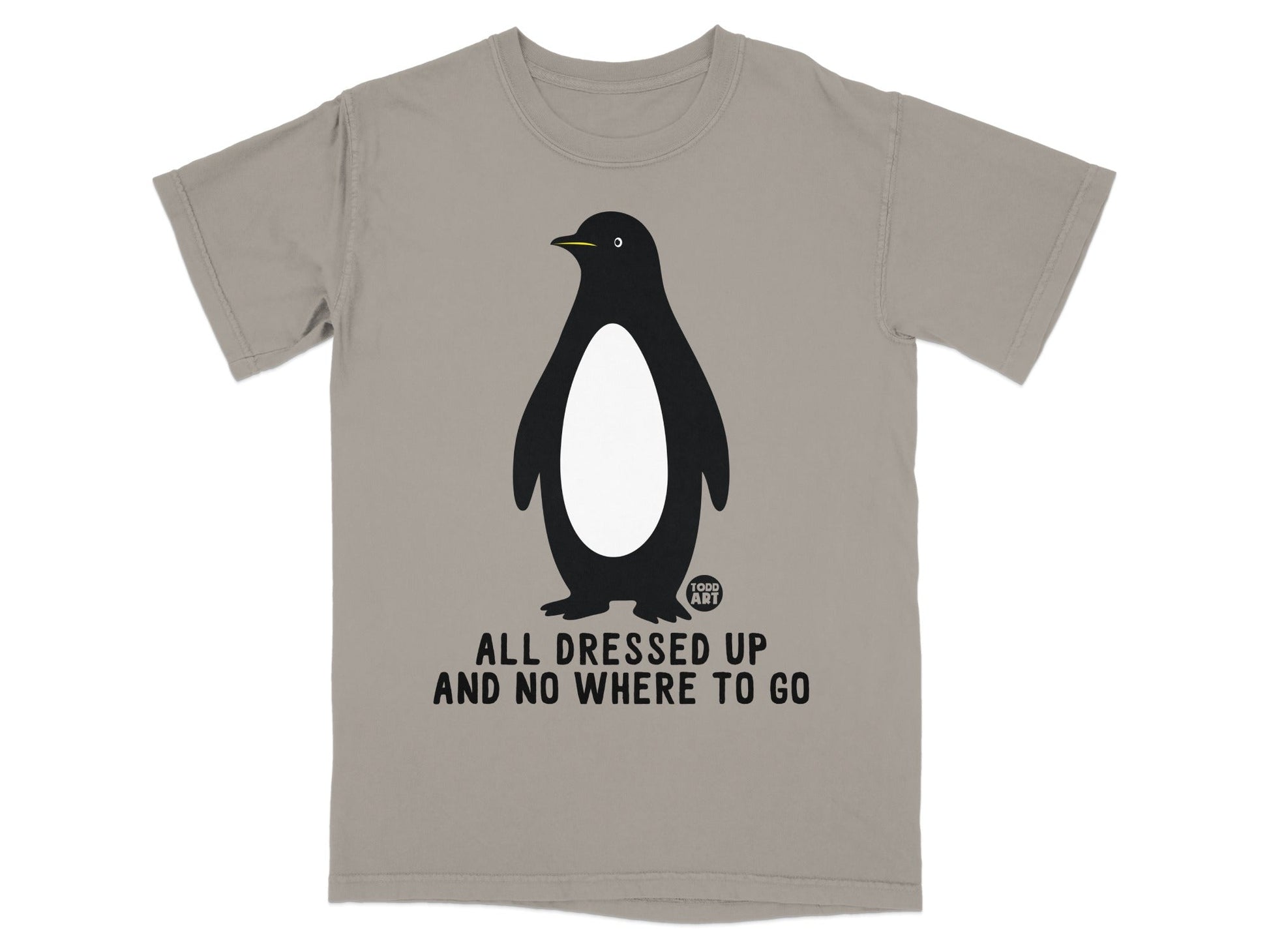 Grey t-shirt with a penguin graphic and text "ALL DRESSED UP AND NO WHERE TO GO".