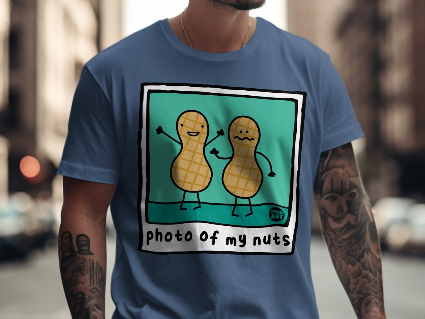 T-shirt with cartoon peanuts saying "photo of my nuts."