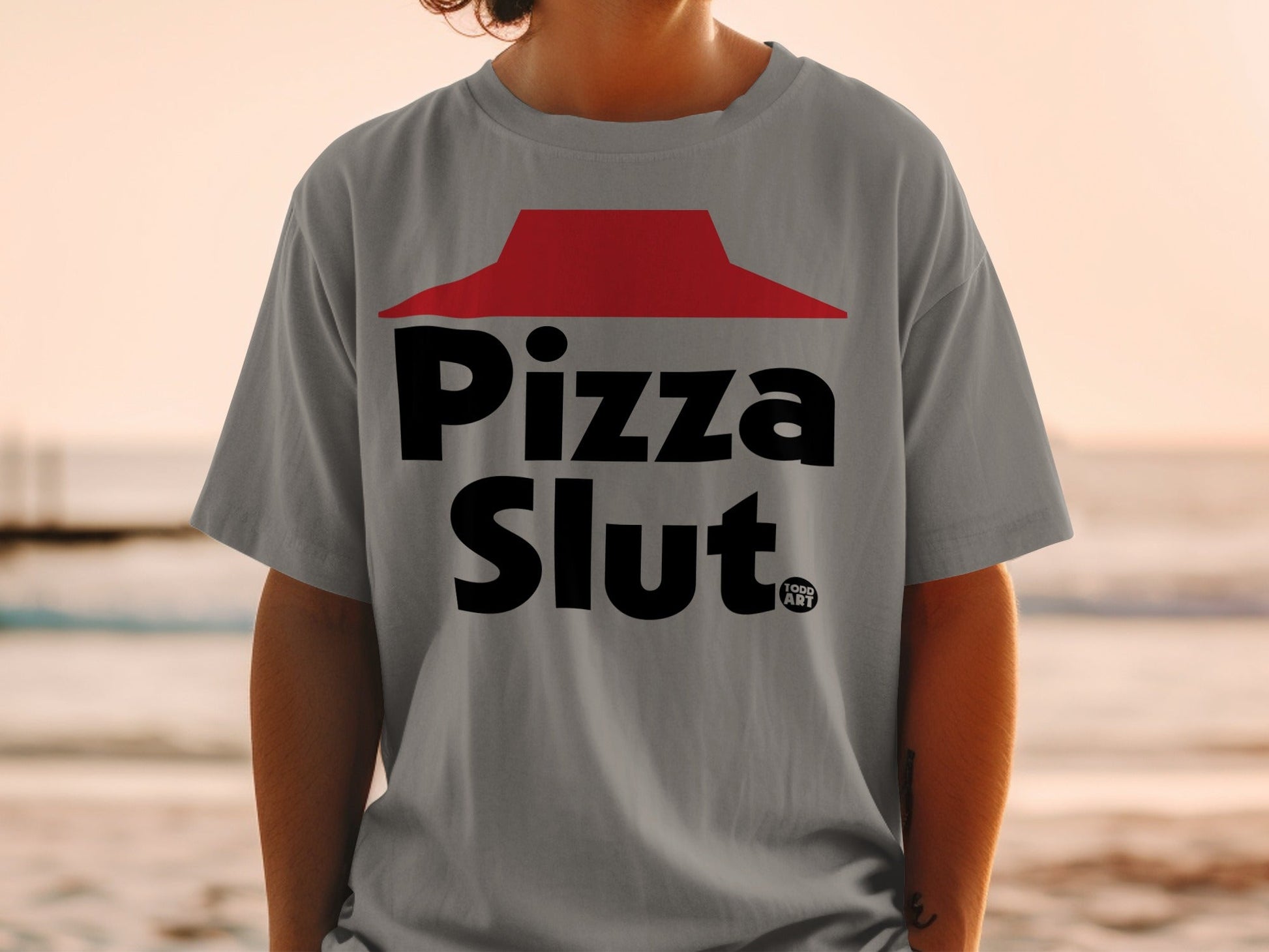 Gray t-shirt with "Pizza Slut" text and red Hut logo.
