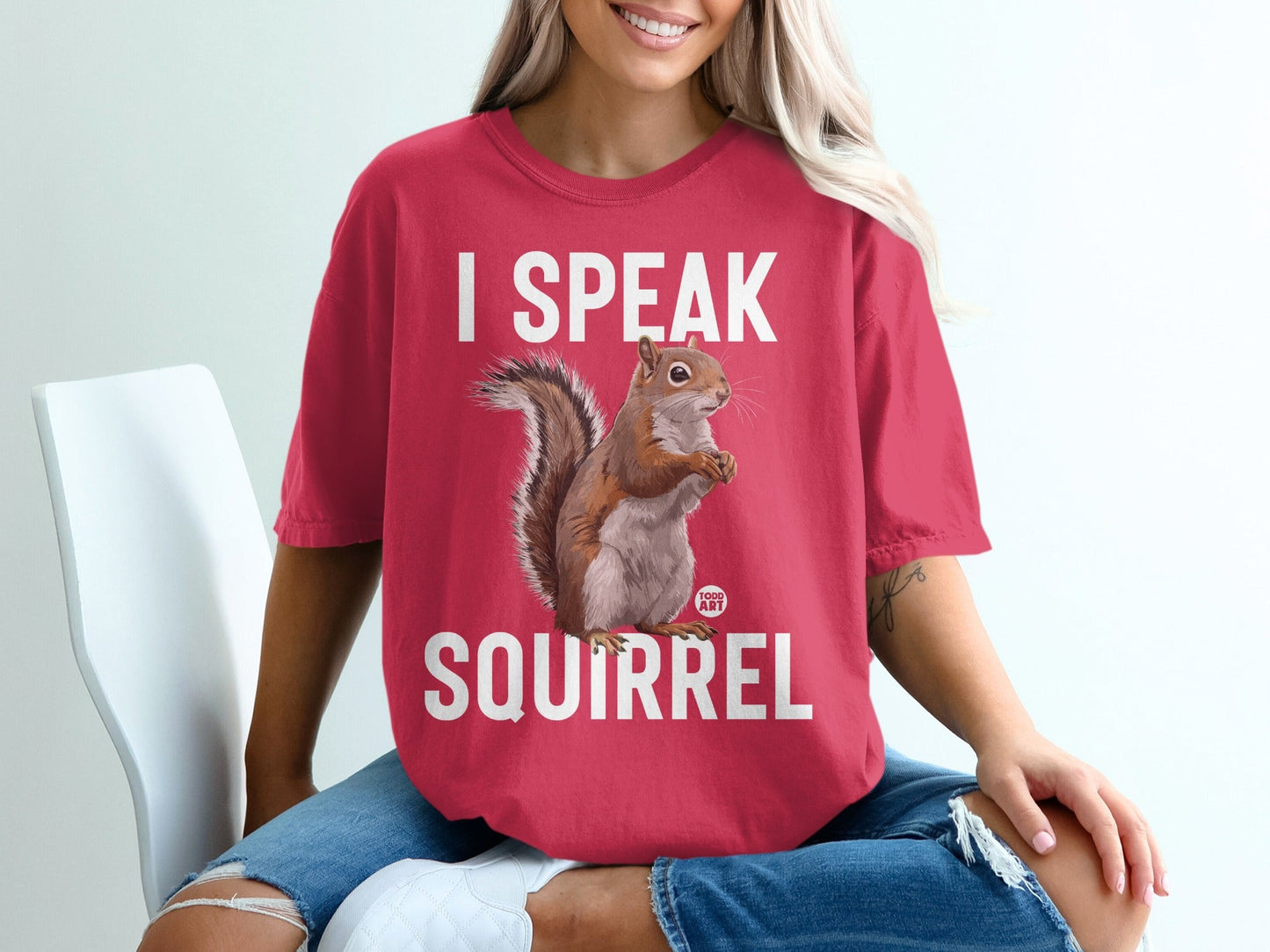 Red t-shirt with "I SPEAK SQUIRREL" and a squirrel graphic.