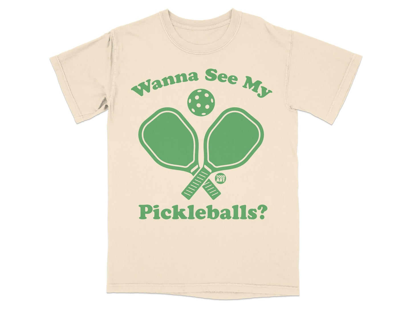 Cream t-shirt with green pickleball paddles and ball, saying "Wanna See My Pickleballs?"