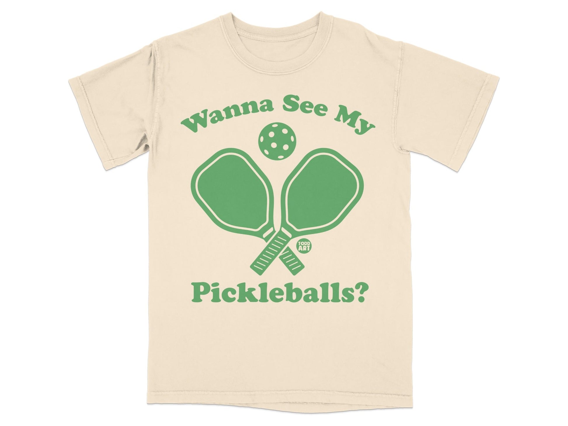 Cream t-shirt with green pickleball paddles and ball, saying "Wanna See My Pickleballs?"