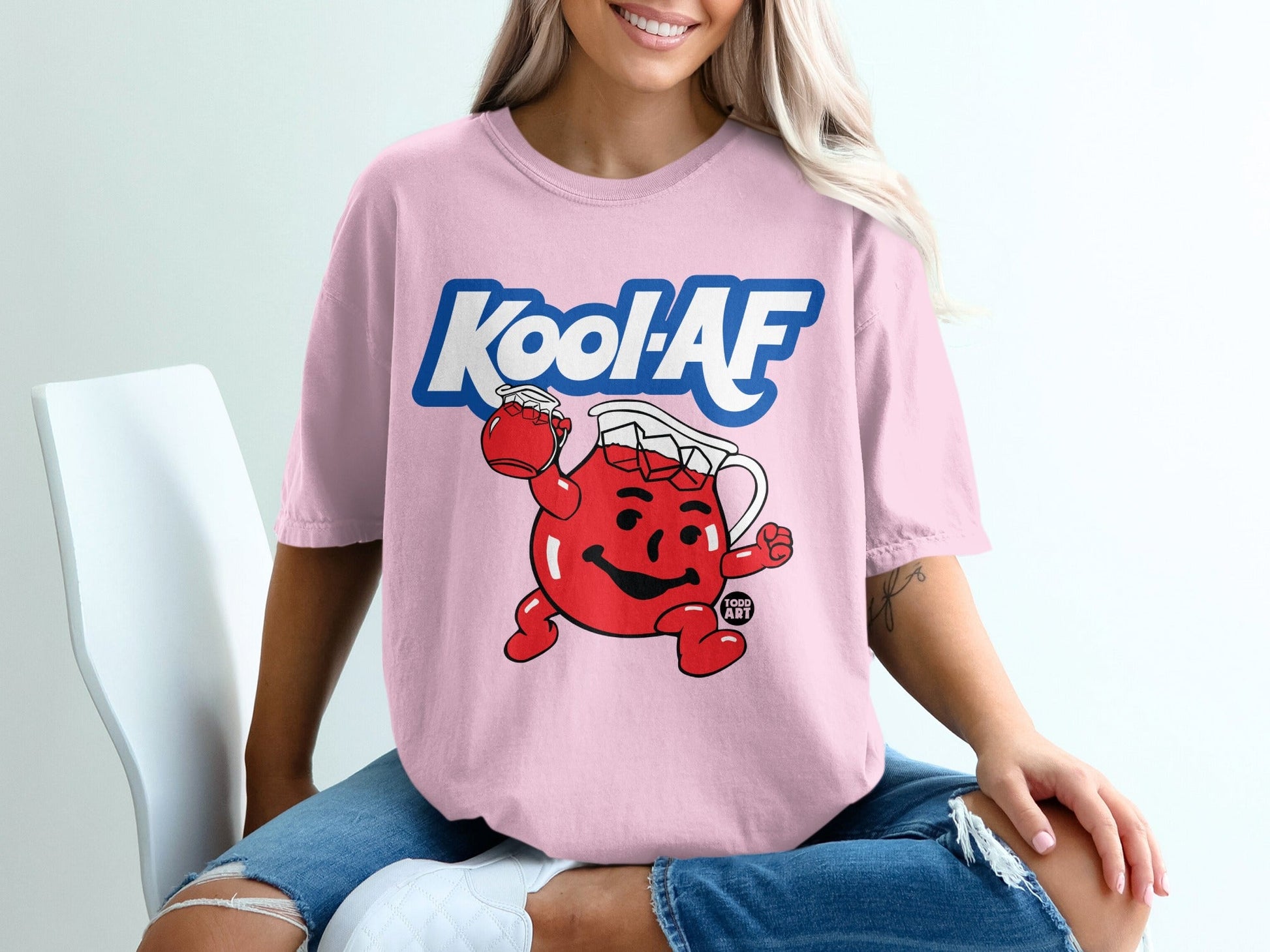Pink t-shirt with Kool-Aid Man graphic and "Kool-AF" text.
