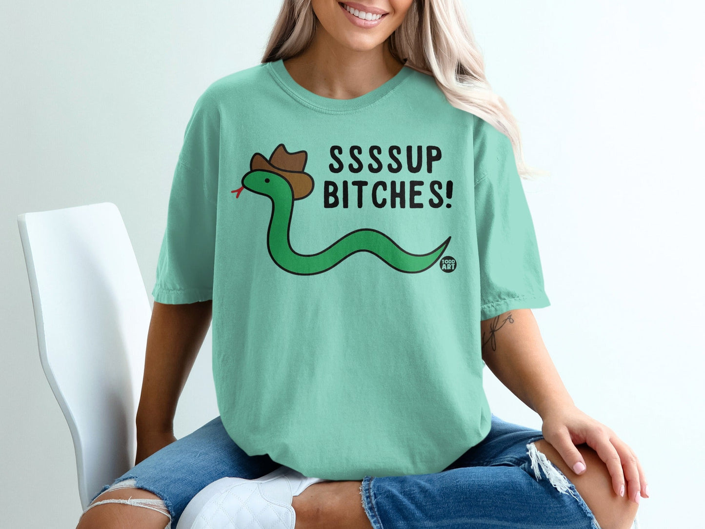 Green snake wearing a cowboy hat with text "SSSSUP BITCHES!".