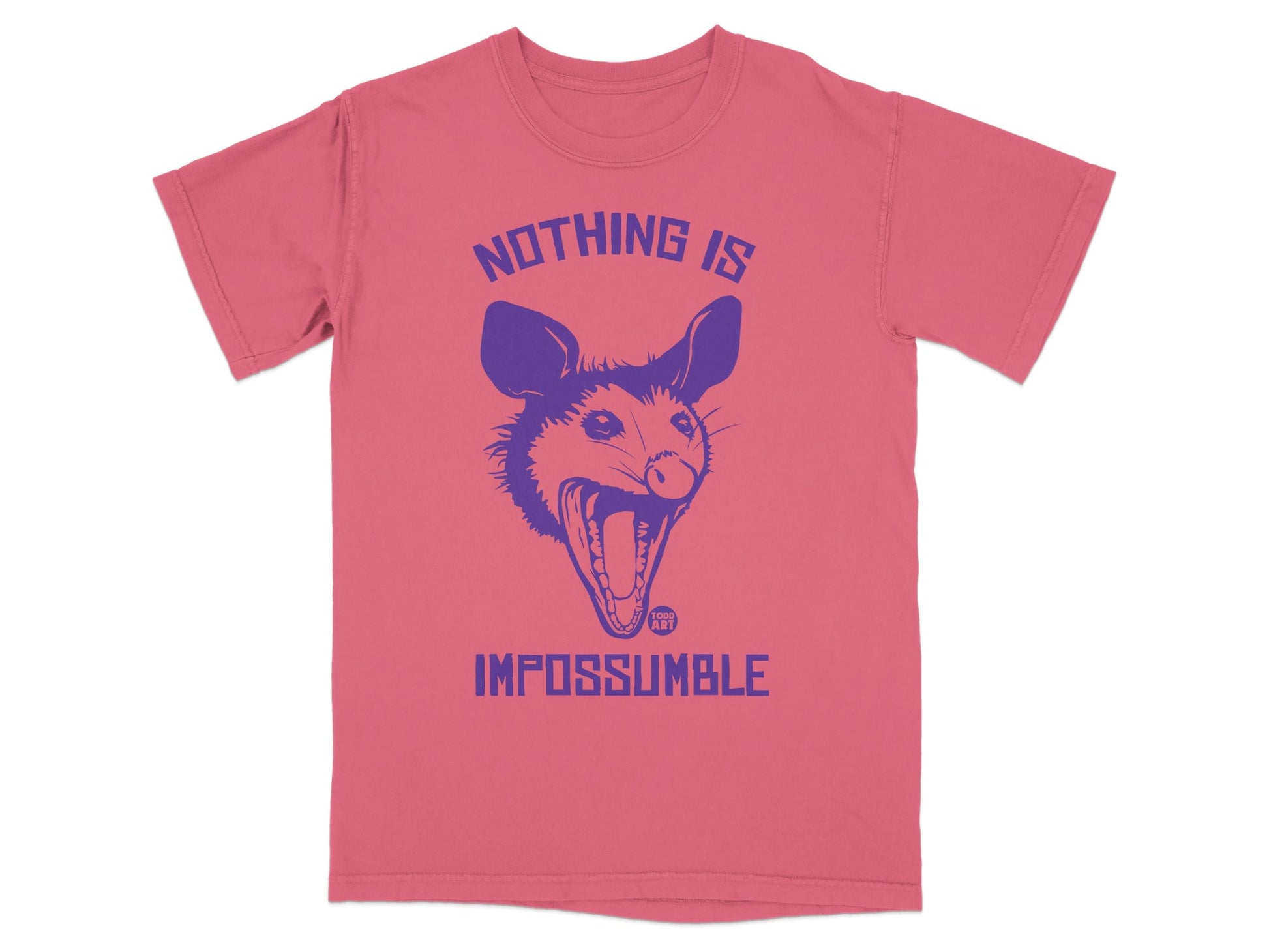 Pink t-shirt with a purple possum graphic and text "NOTHING IS IMPOSSIBLE".