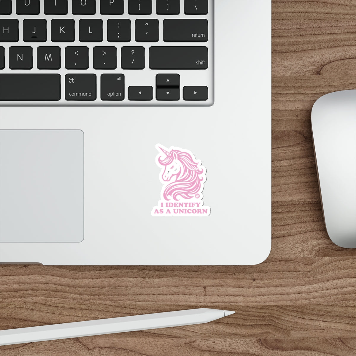 Pink unicorn sticker with text "I IDENTIFY AS A UNICORN".