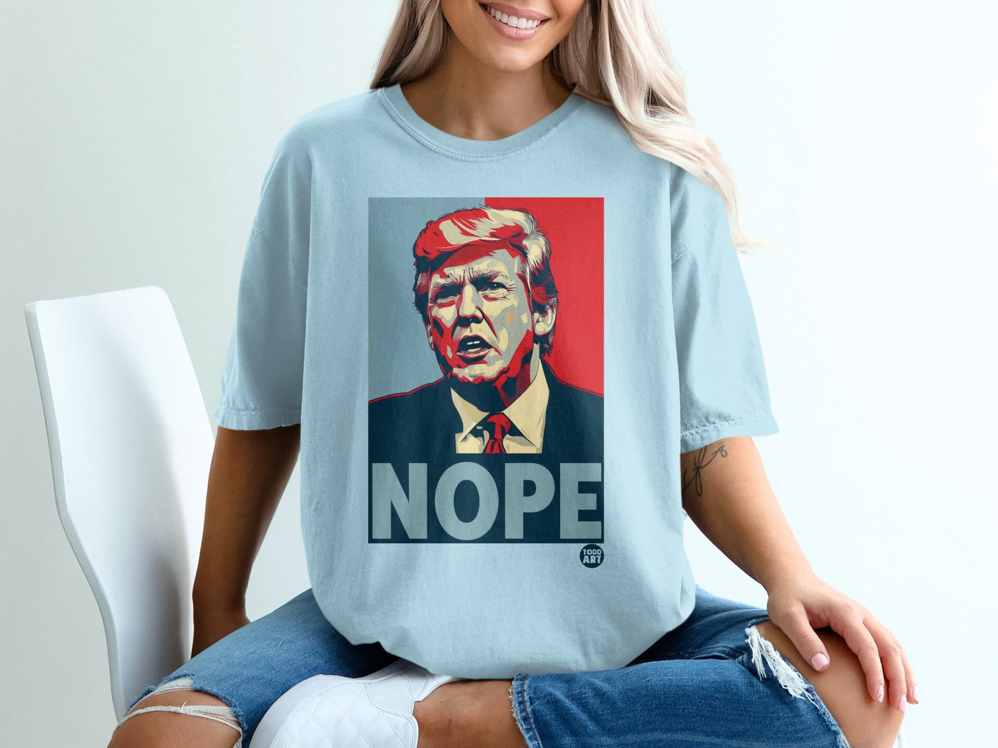 T-shirt featuring a portrait of Donald Trump with "NOPE" text.