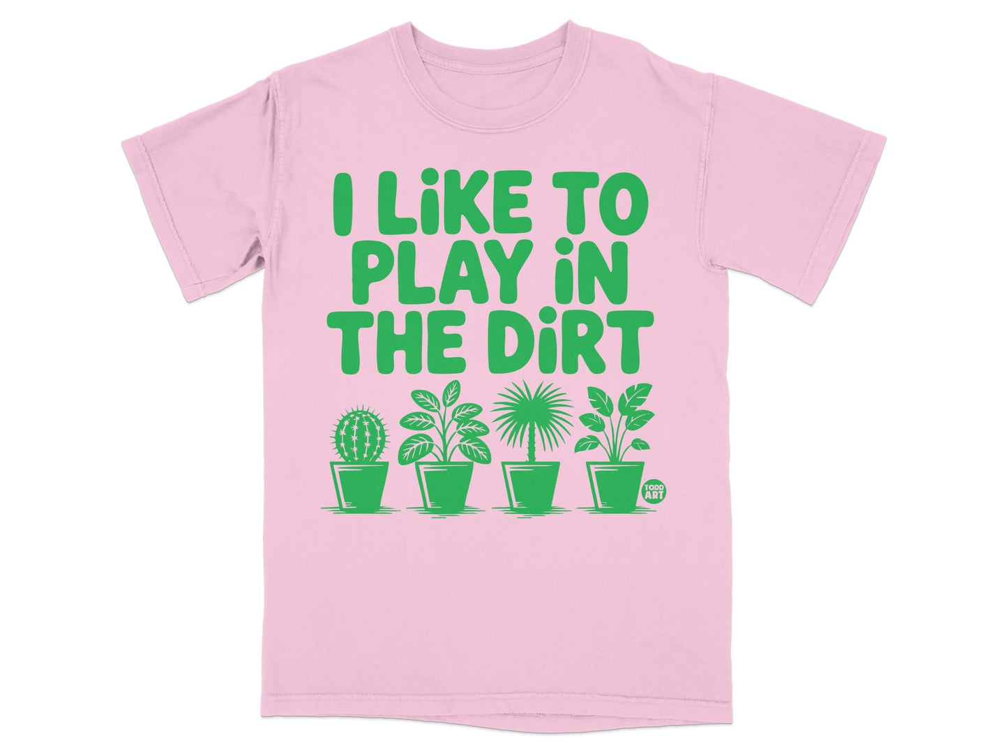Pink t-shirt with green text "I LIKE TO PLAY IN THE DIRT" and potted plants.