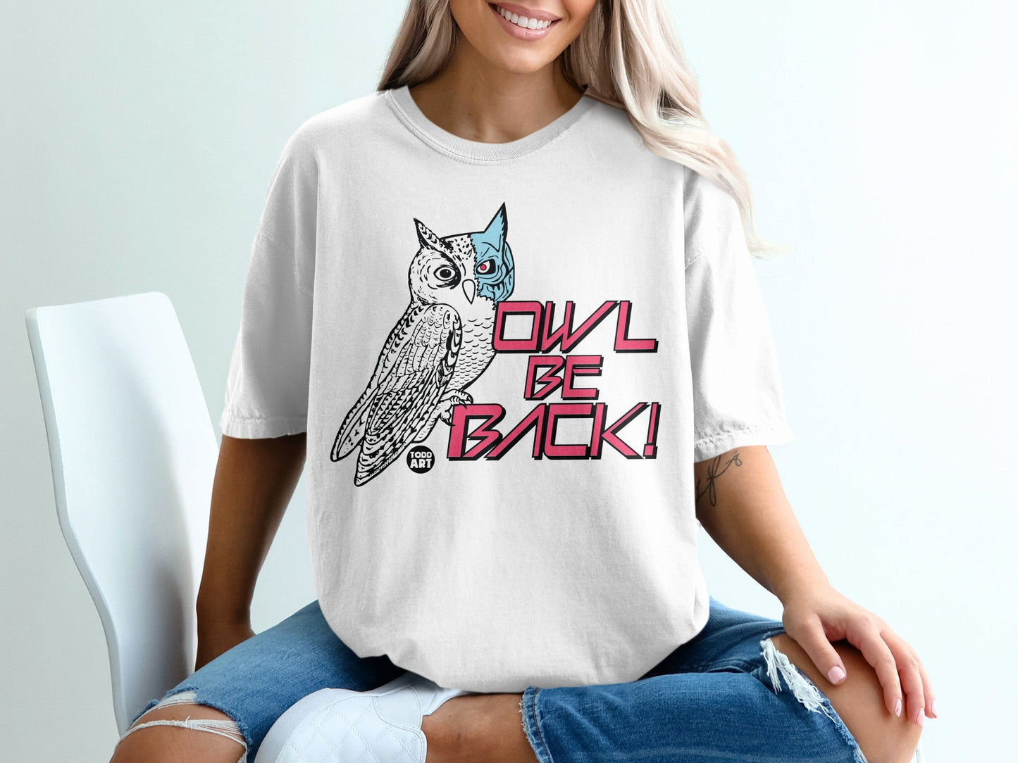 White t-shirt with owl graphic and "OWL BE BACK!" text.