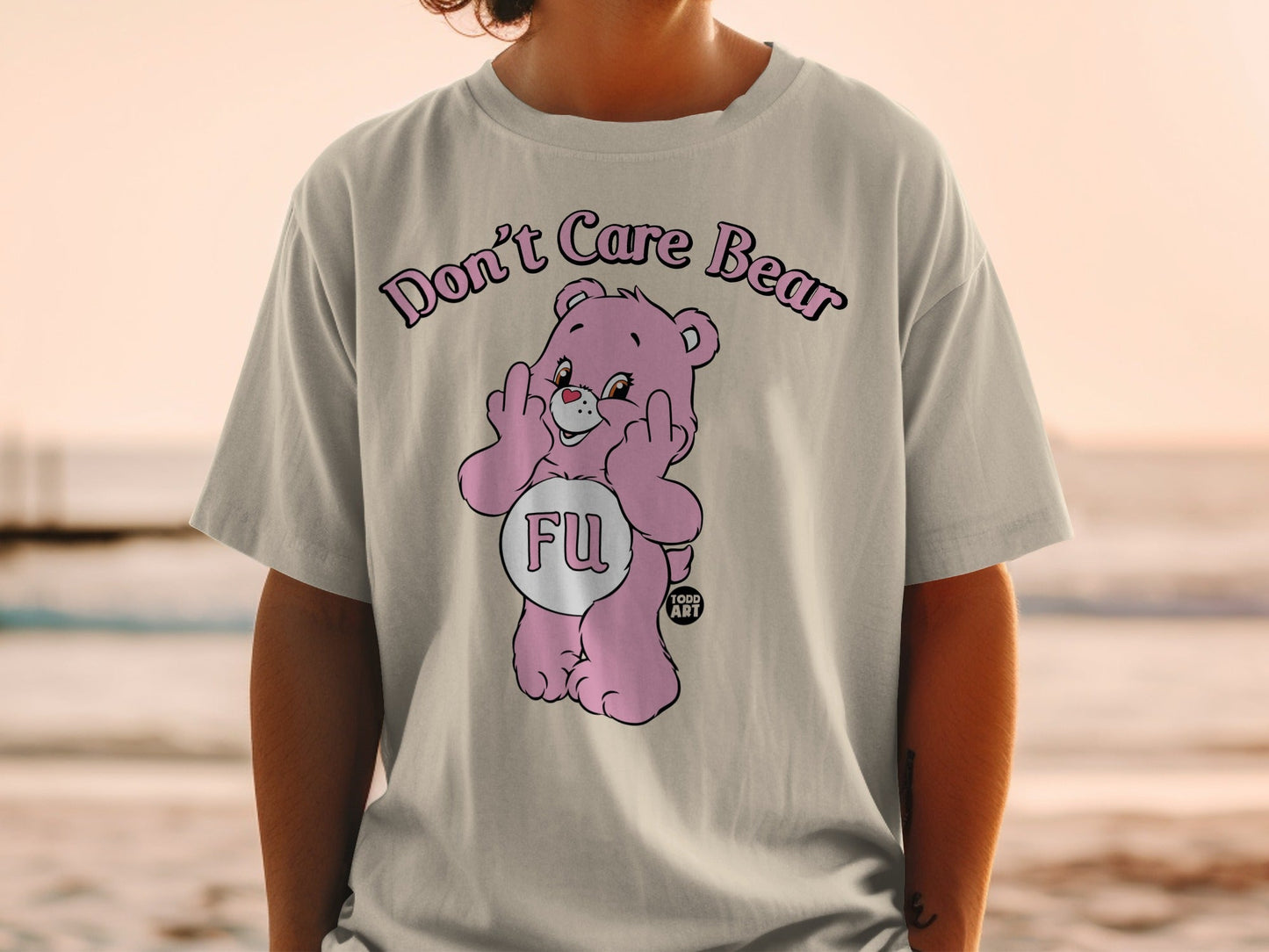 Pink Care Bear t-shirt with "FU" and middle fingers graphic.