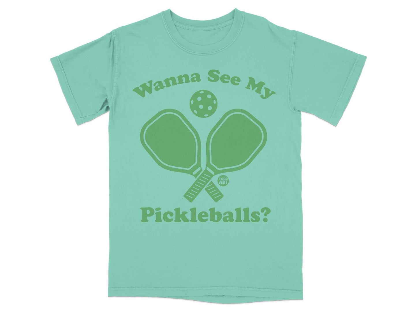 Teal t-shirt with green pickleball paddles and ball graphic.