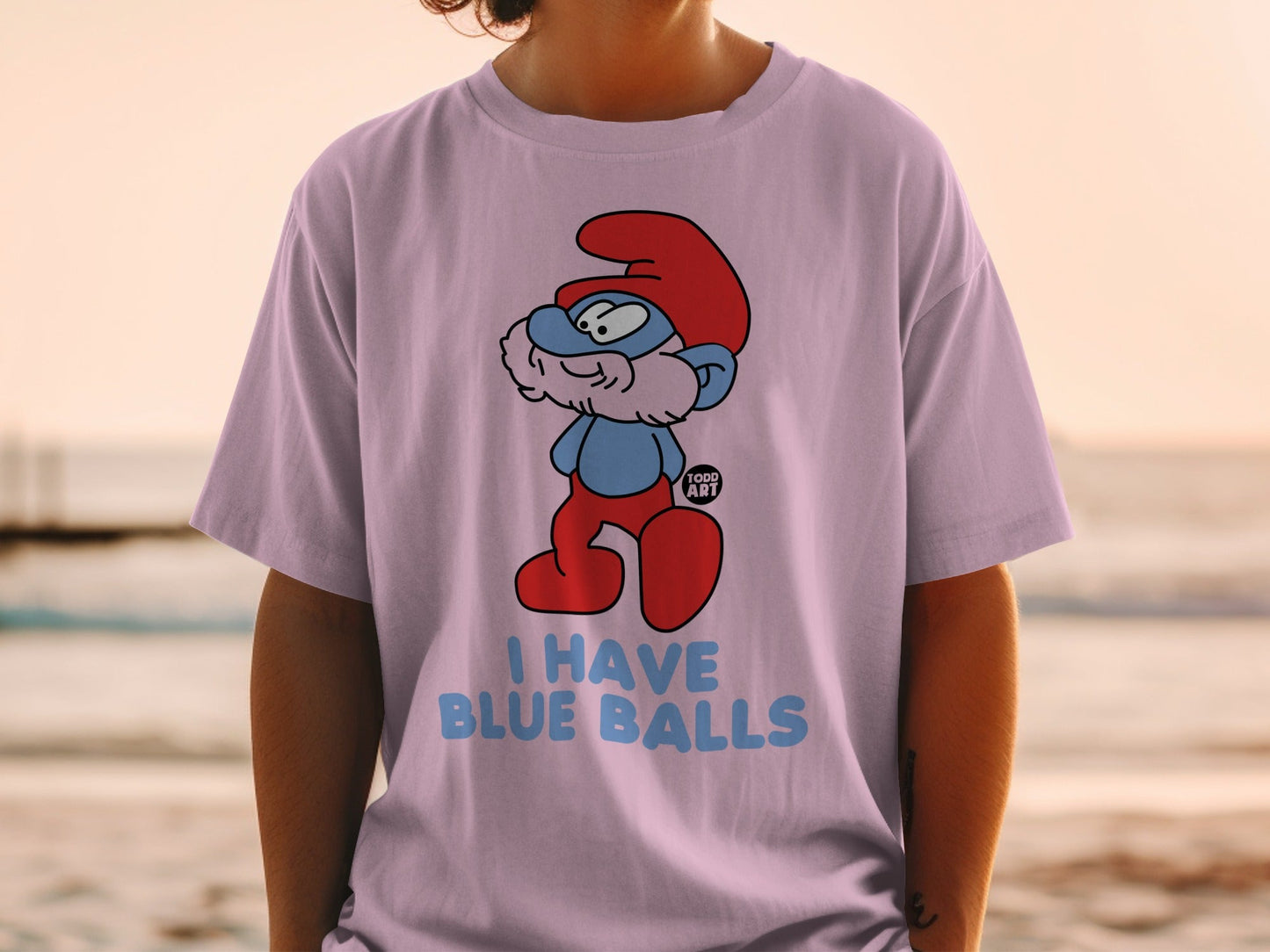 Smurf wearing red shoes and hat, saying "I have blue balls."
