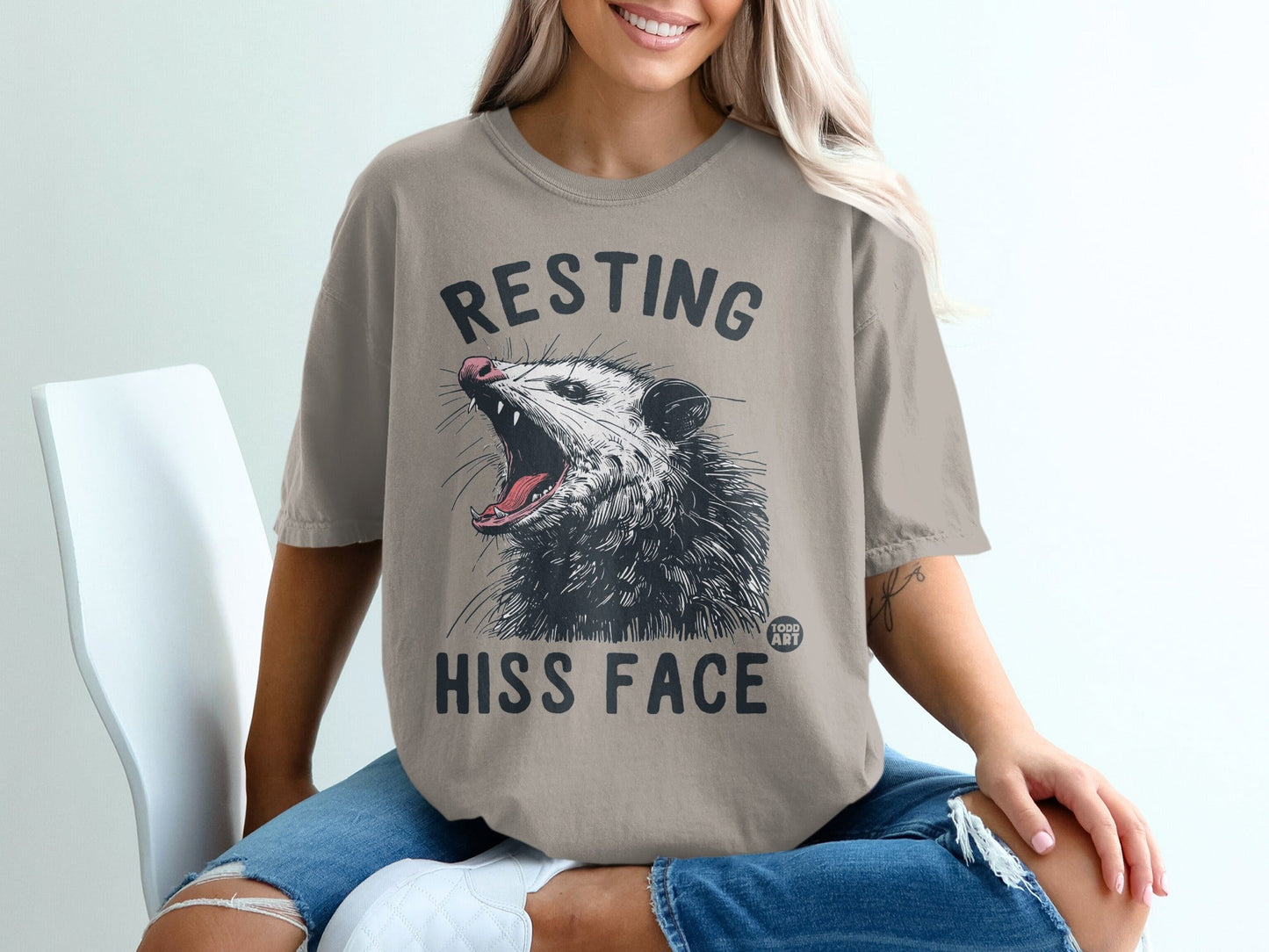 Opossum yawning with text "RESTING HISS FACE" on a t-shirt.