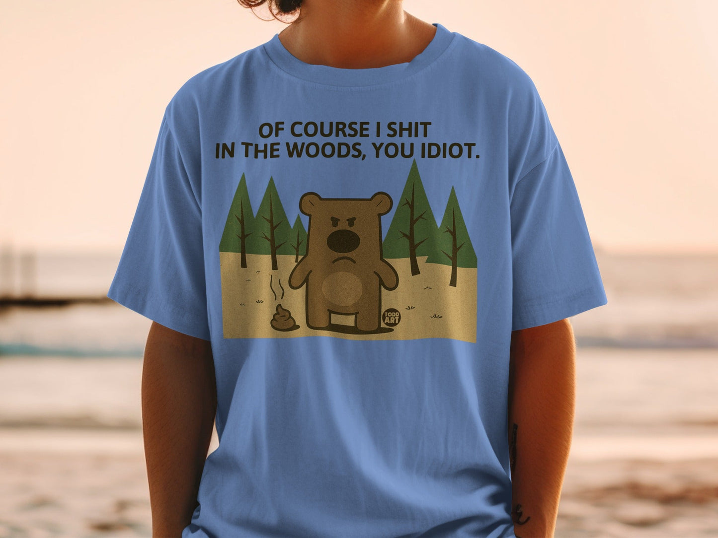 Blue t-shirt with bear and text: "Of course I shit in the woods, you idiot."