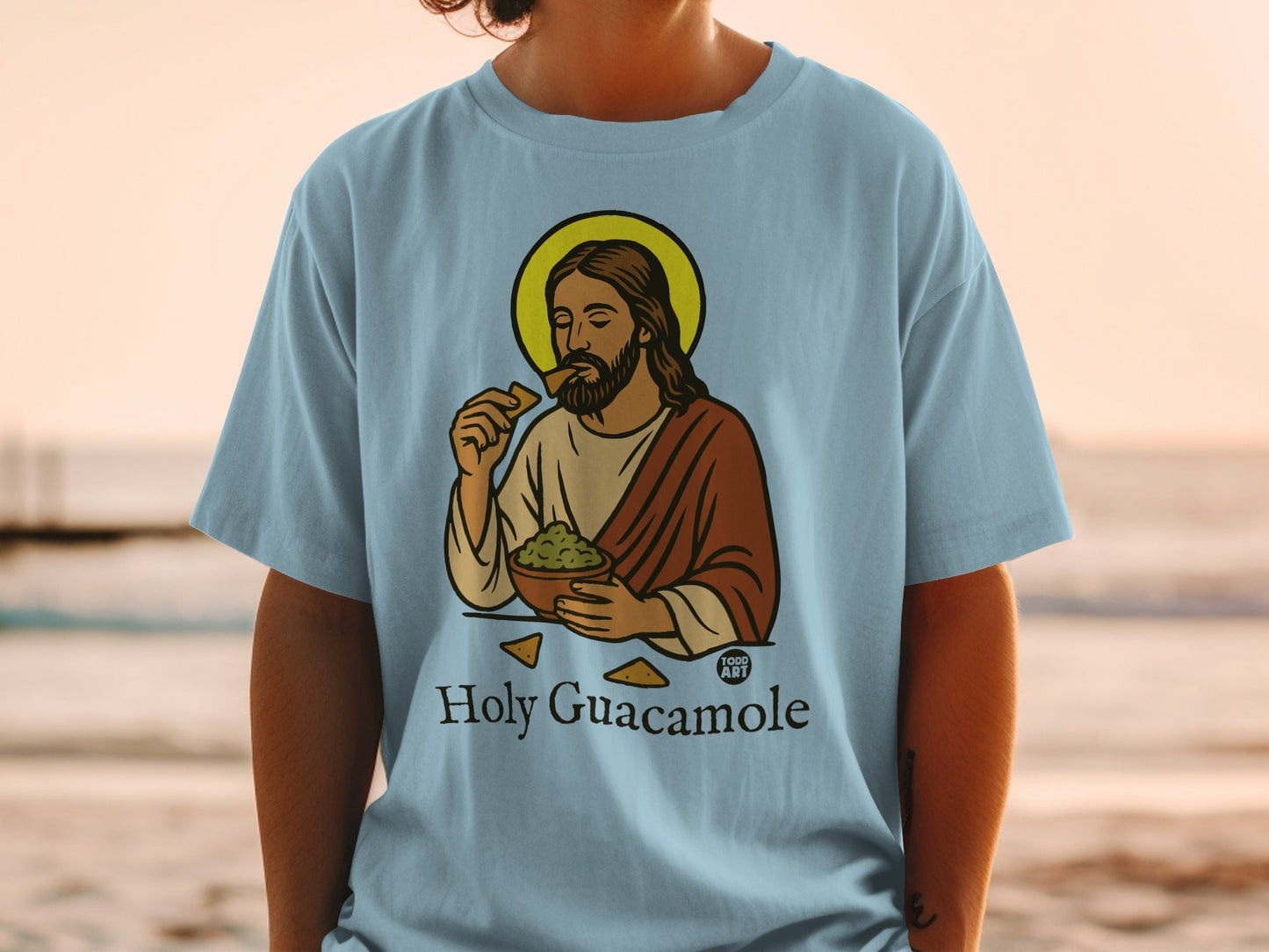 Jesus eating guacamole and chips, "Holy Guacamole" text.