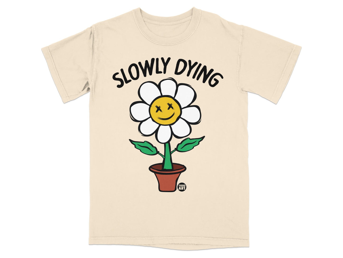 Beige t-shirt with a smiling flower labeled "SLOWLY DYING" and "TODO ART".