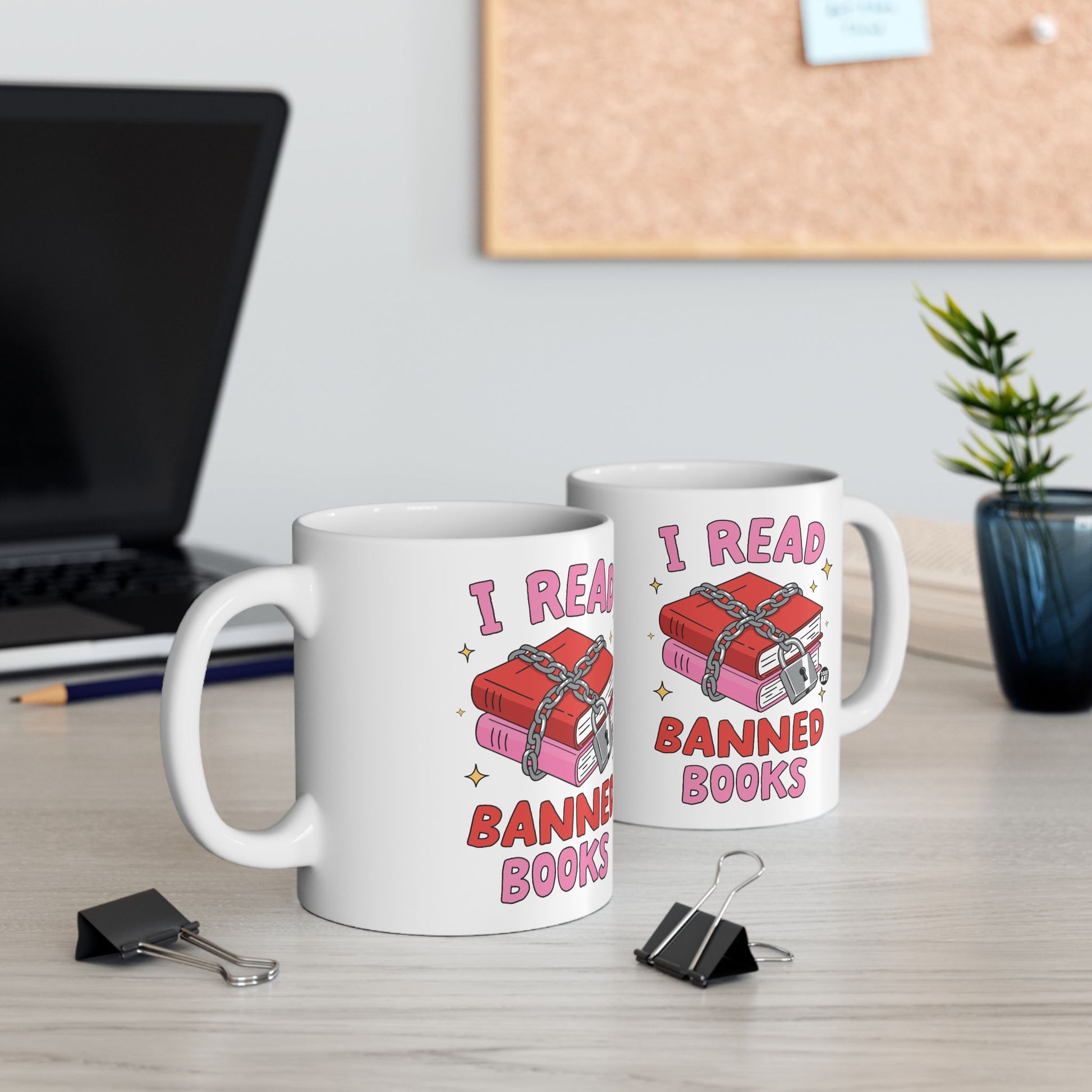 White mugs with chained books and "I Read Banned Books" text.
