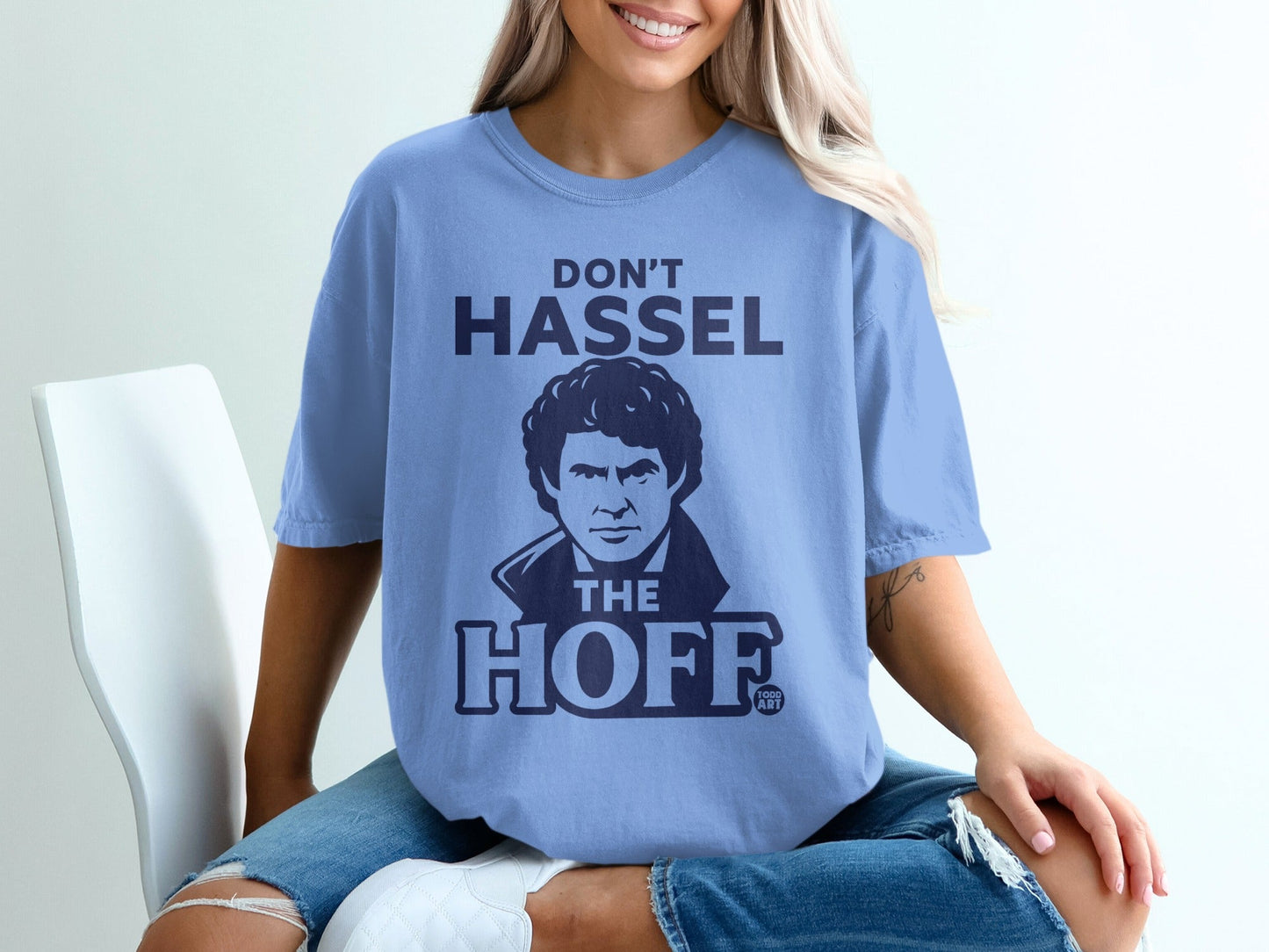 Light blue t-shirt with "Don't Hassel The Hoff" graphic.