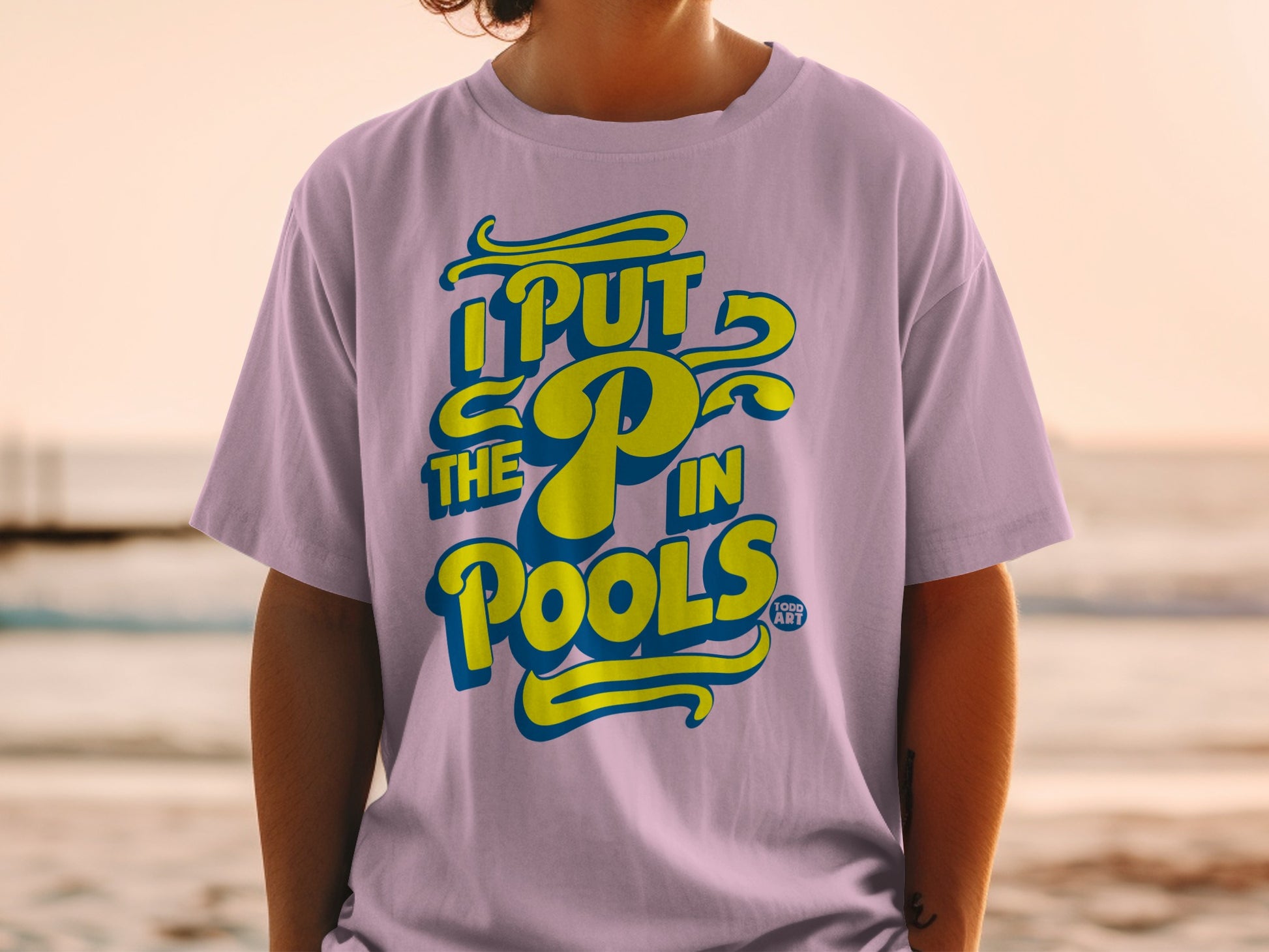 Purple t-shirt with "I PUT THE P IN POOLS" in yellow and blue text.