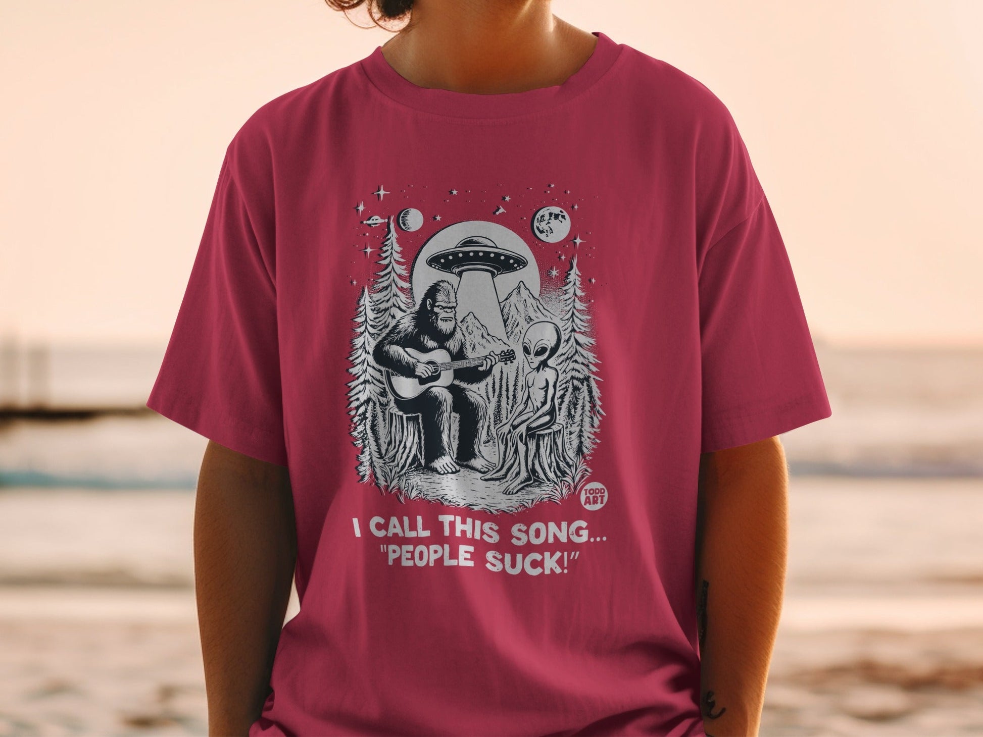 Bigfoot and Alien Graphic T-Shirt with Humorous Quote