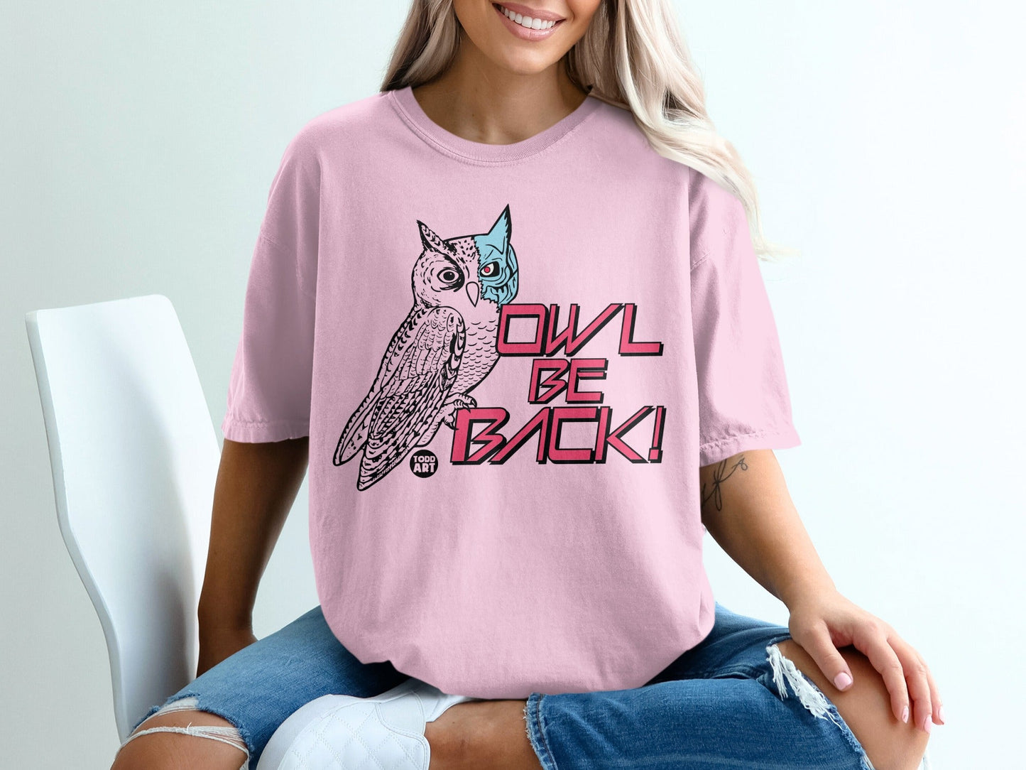 Pink t-shirt with an owl graphic and "OWL BE BACK!" text.