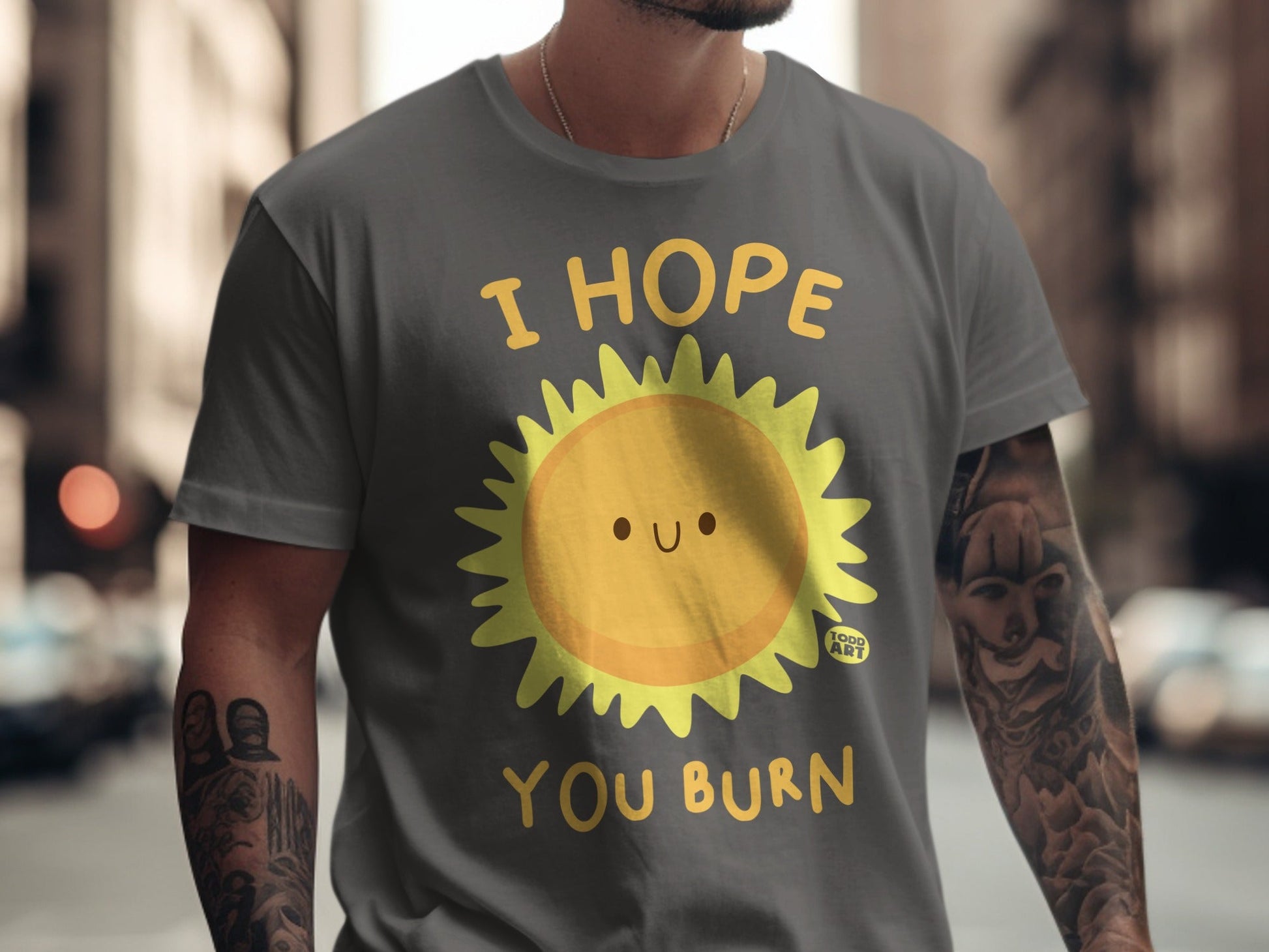 Dark gray t-shirt with yellow sun graphic and text "I HOPE YOU BURN".