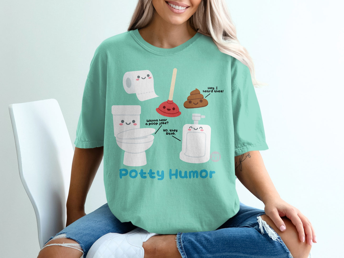 T-shirt with toilet paper, poop emoji, and soap dispenser, text "Potty Humor".