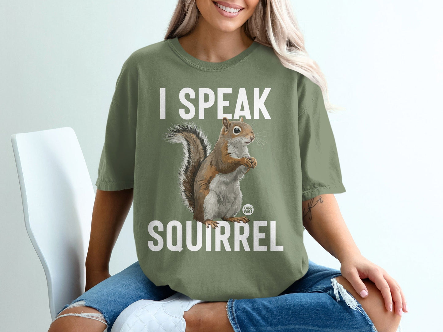 Green t-shirt with "I SPEAK SQUIRREL" and a squirrel graphic.