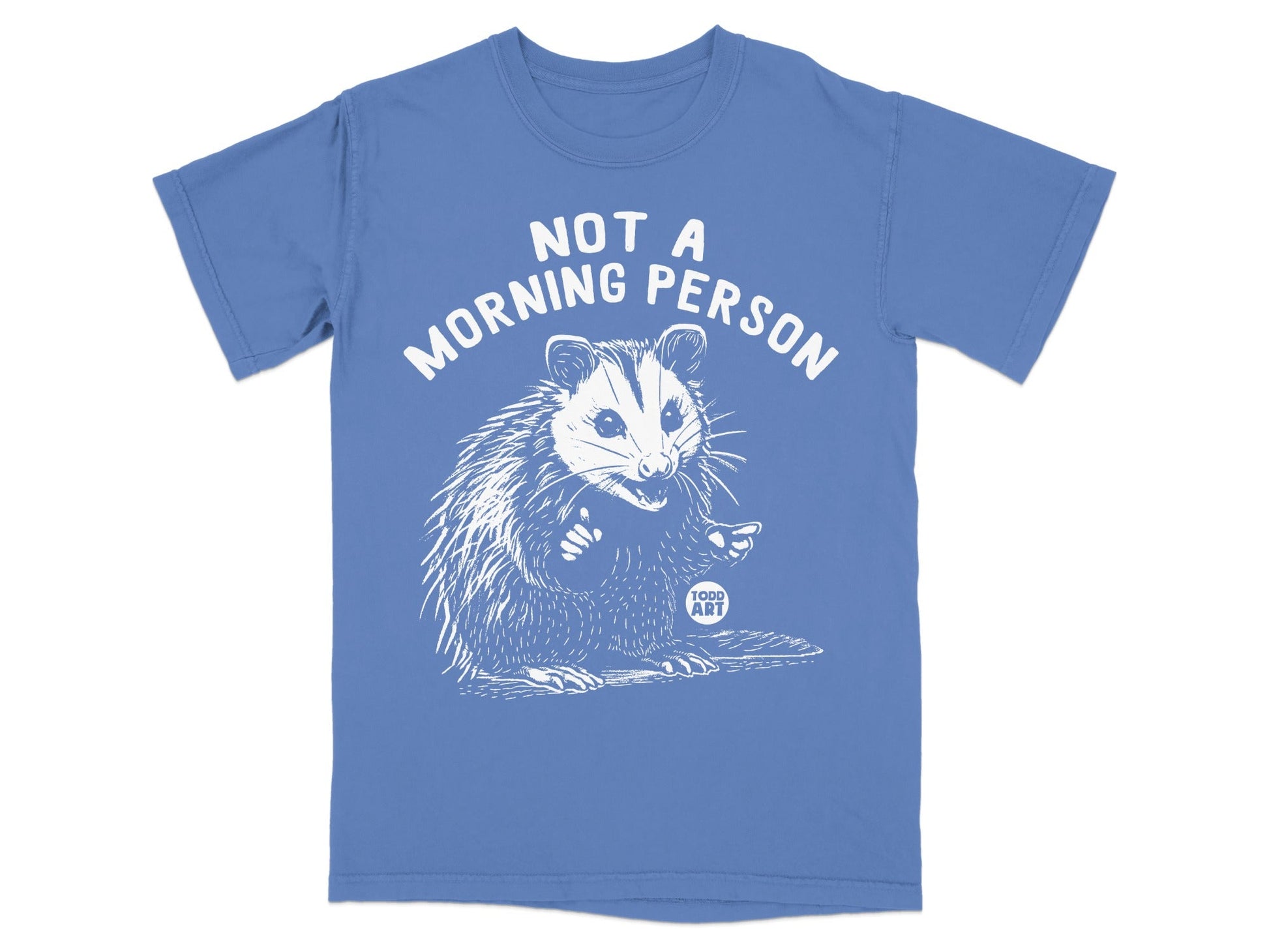 Blue t-shirt with white graphic of a possum giving a thumbs up, text reads "NOT A MORNING PERSON".