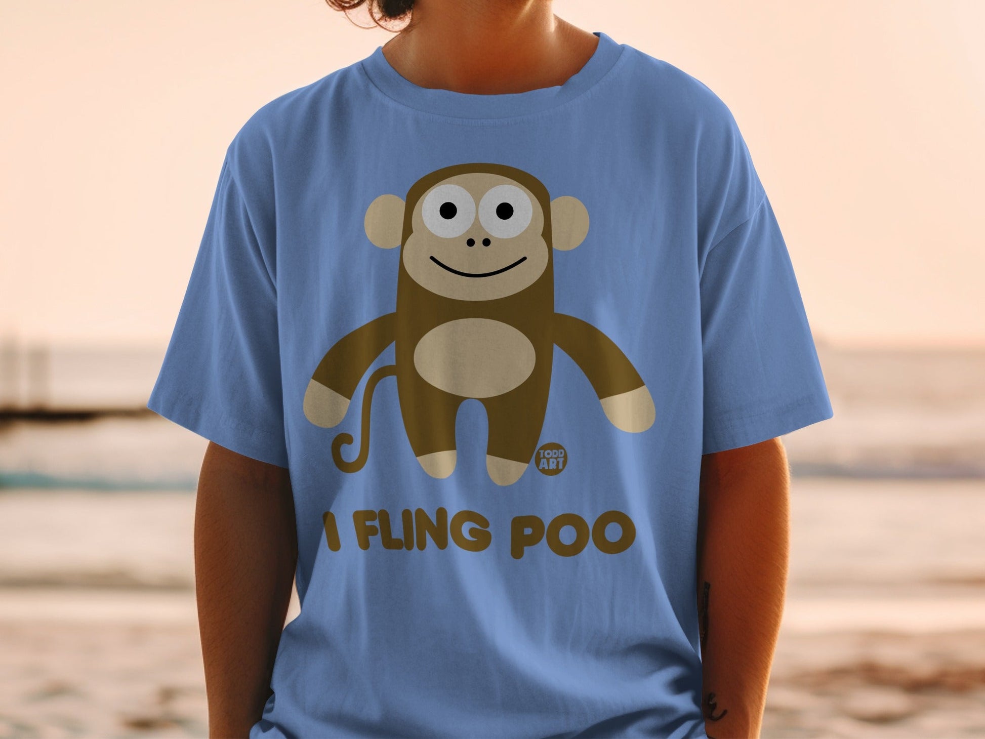 Brown monkey graphic with "I FLING POO" text on a blue t-shirt.