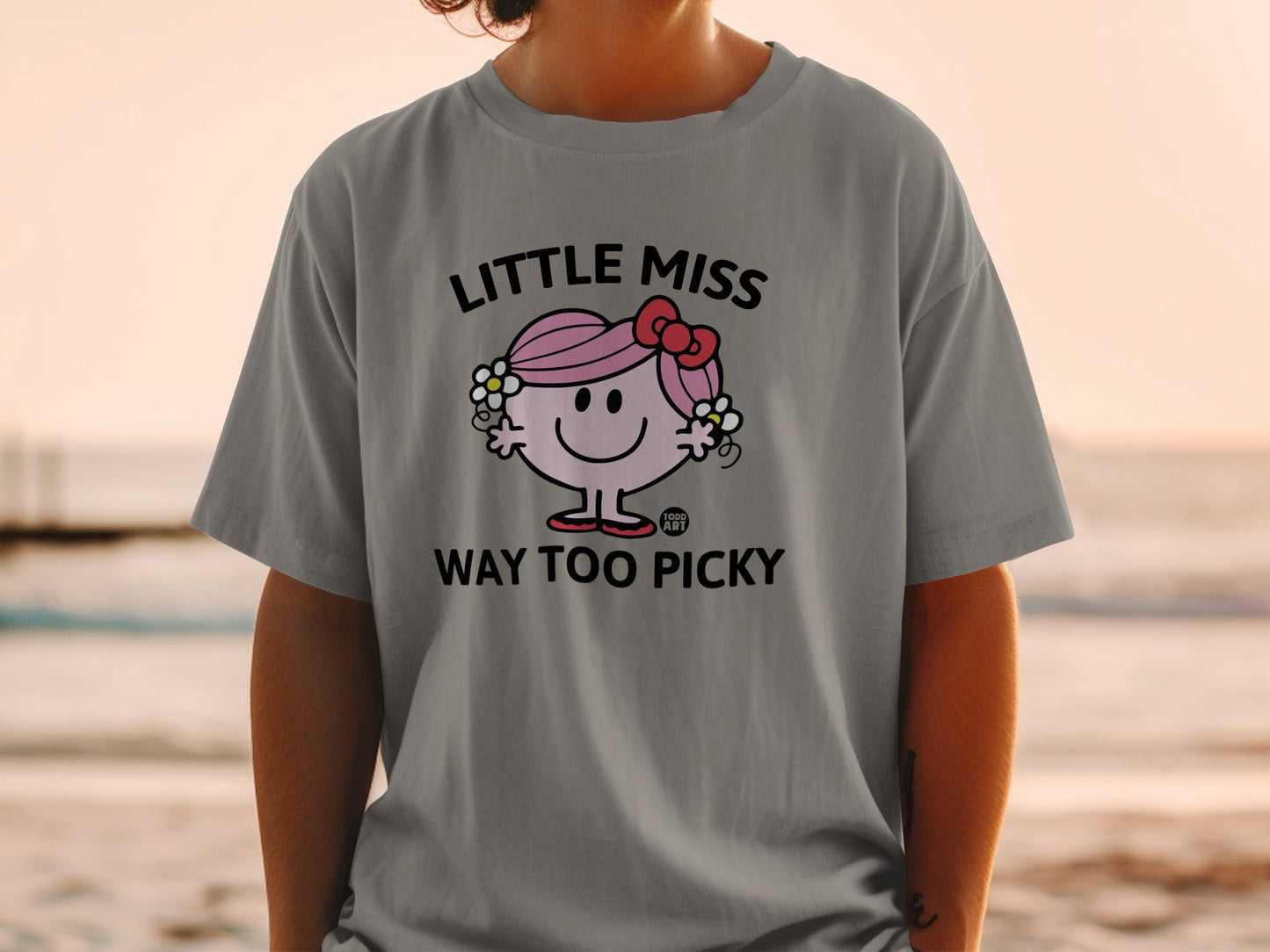 Little Miss Too Way Picky graphic tee with bow and text.