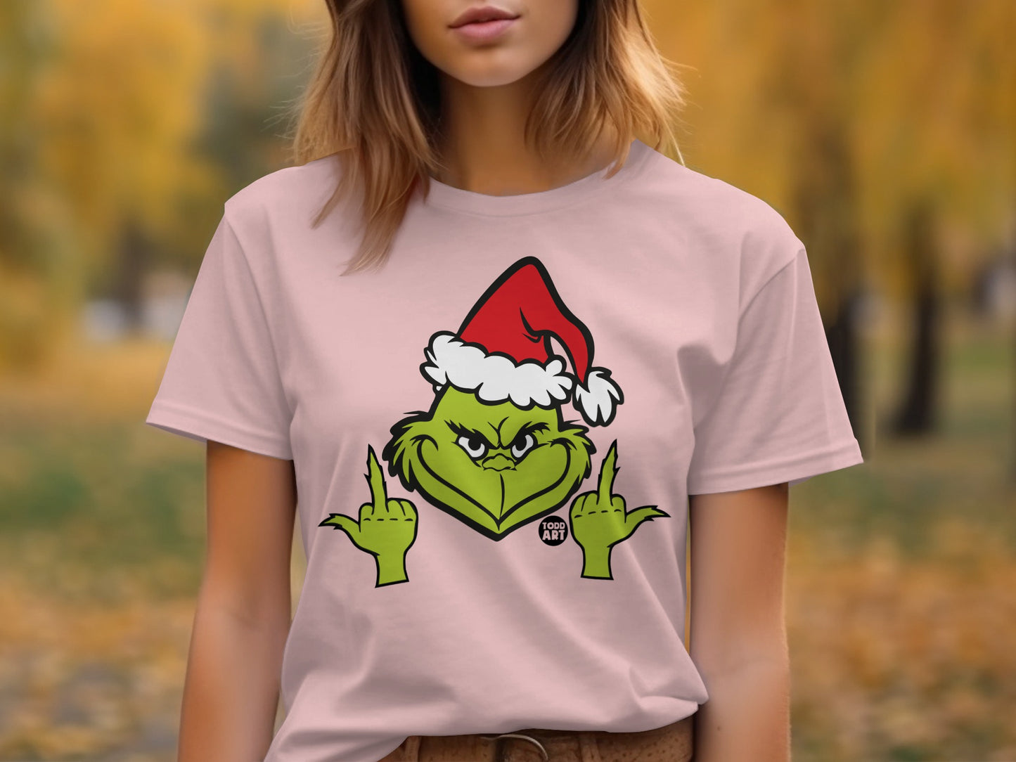 Grinch Giving Middle Fingers Festive Graphic Tee Product