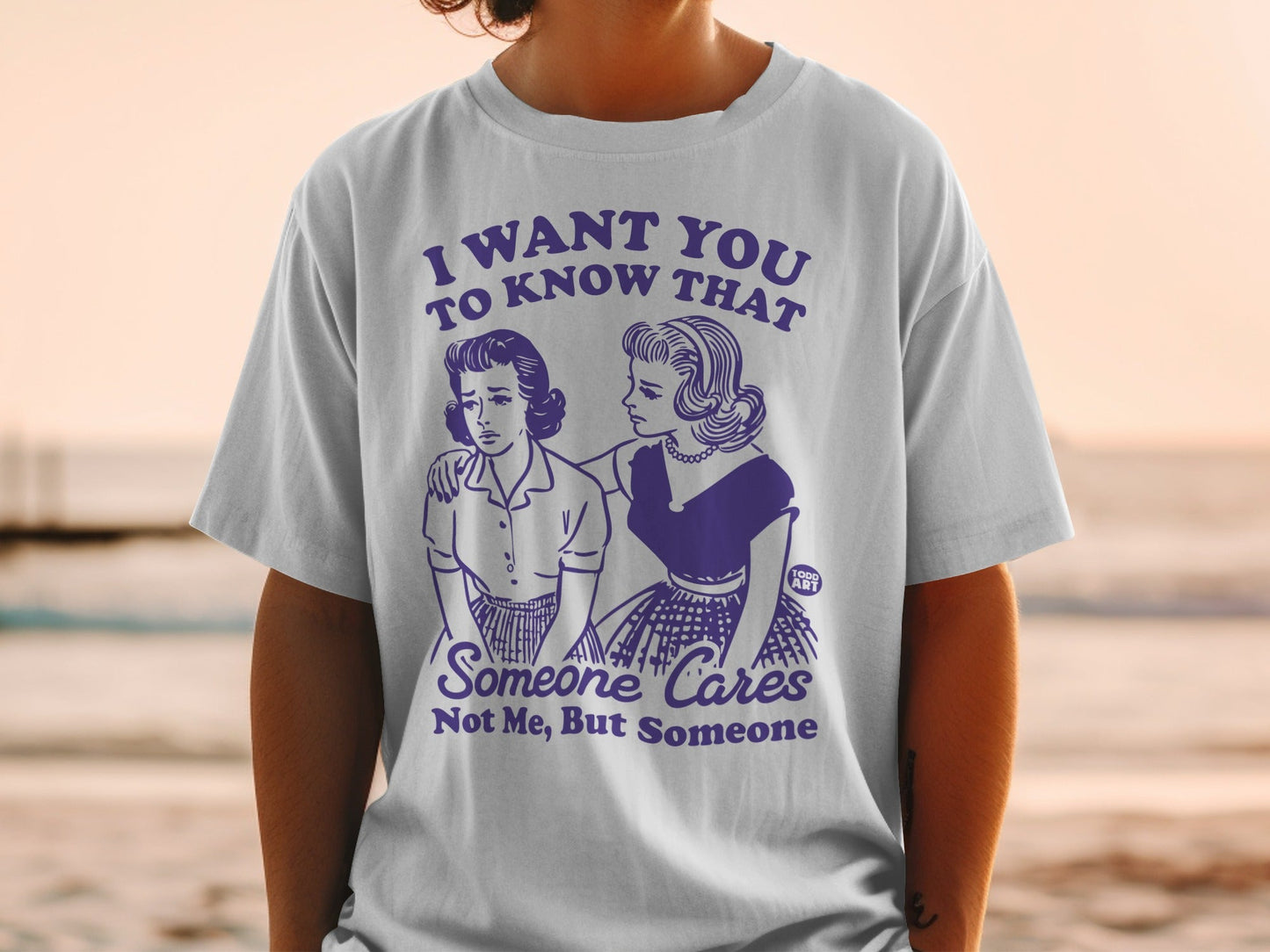 T-shirt with retro illustration and text "I want you to know that Someone Cares Not Me, But Someone."