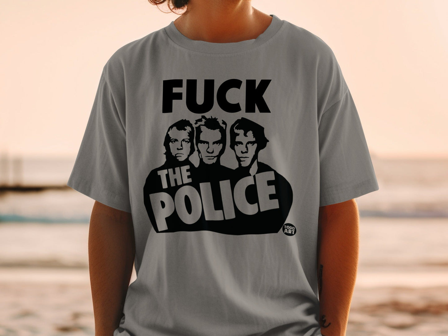 Gray t-shirt with "FUCK THE POLICE" and three band members.