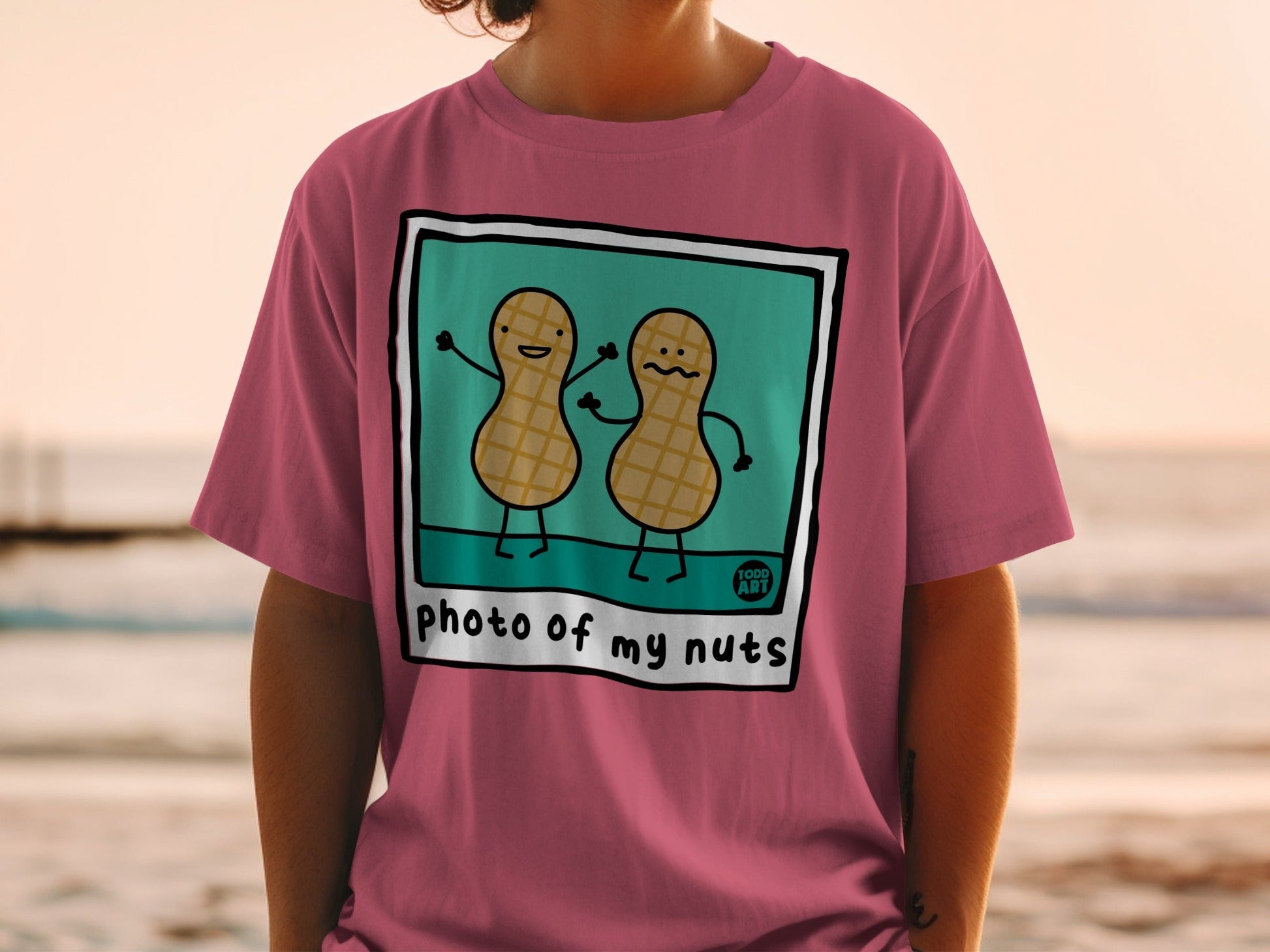 T-shirt with cartoon peanuts saying "photo of my nuts".