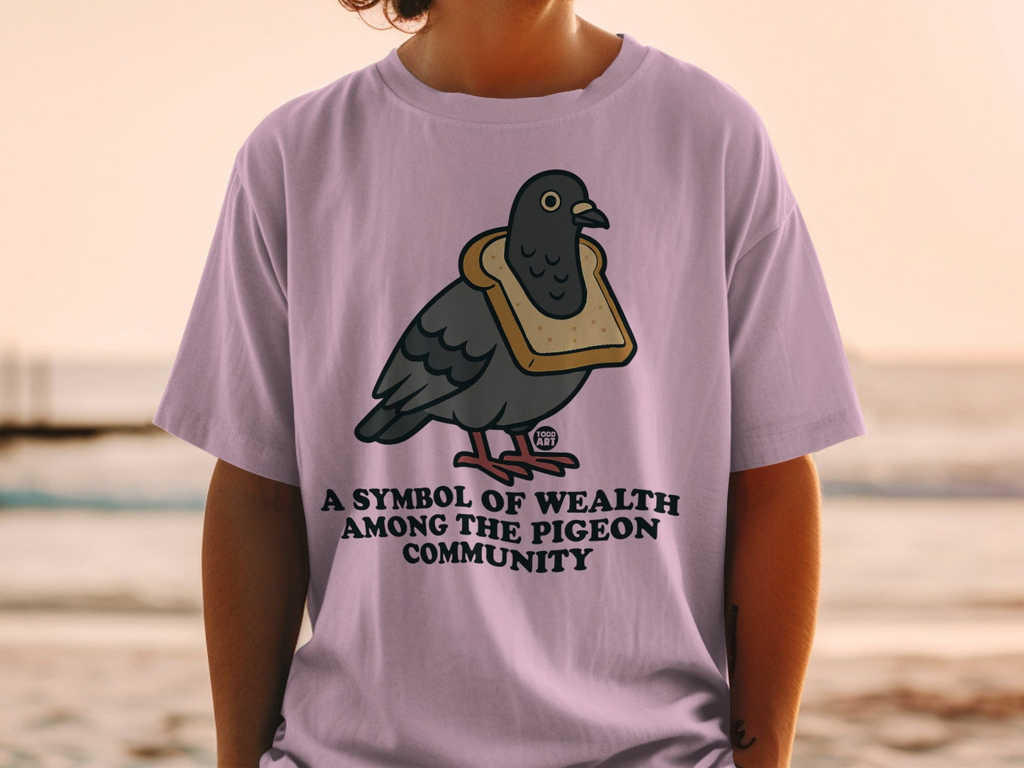 A Symbol of Wealth Among the Pigeon T-Shirt Product
