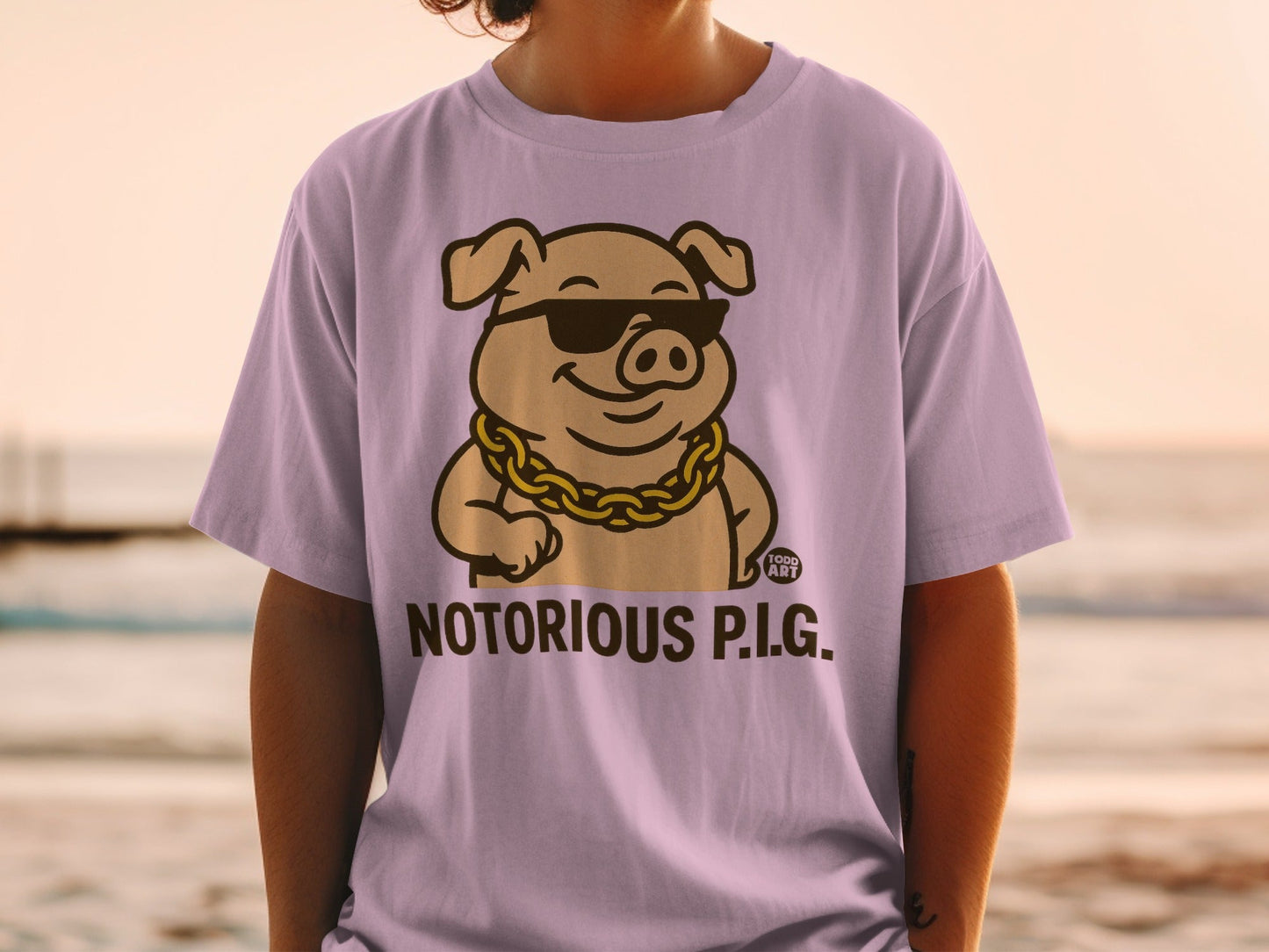 Cartoon pig wearing sunglasses and gold chain, "Notorious P.I.G." text.