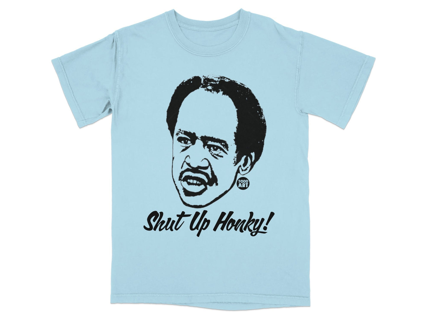 Light blue t-shirt with a black graphic of Redd Foxx saying "Shut Up Honky!".