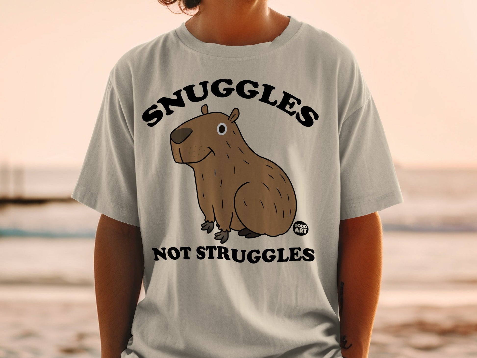 Snuggles Not Struggles Cartoon Capybara T-shirt