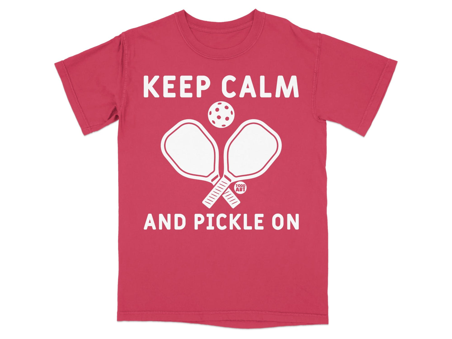 Red t-shirt with white graphic: "KEEP CALM AND PICKLE ON" and pickleball imagery.