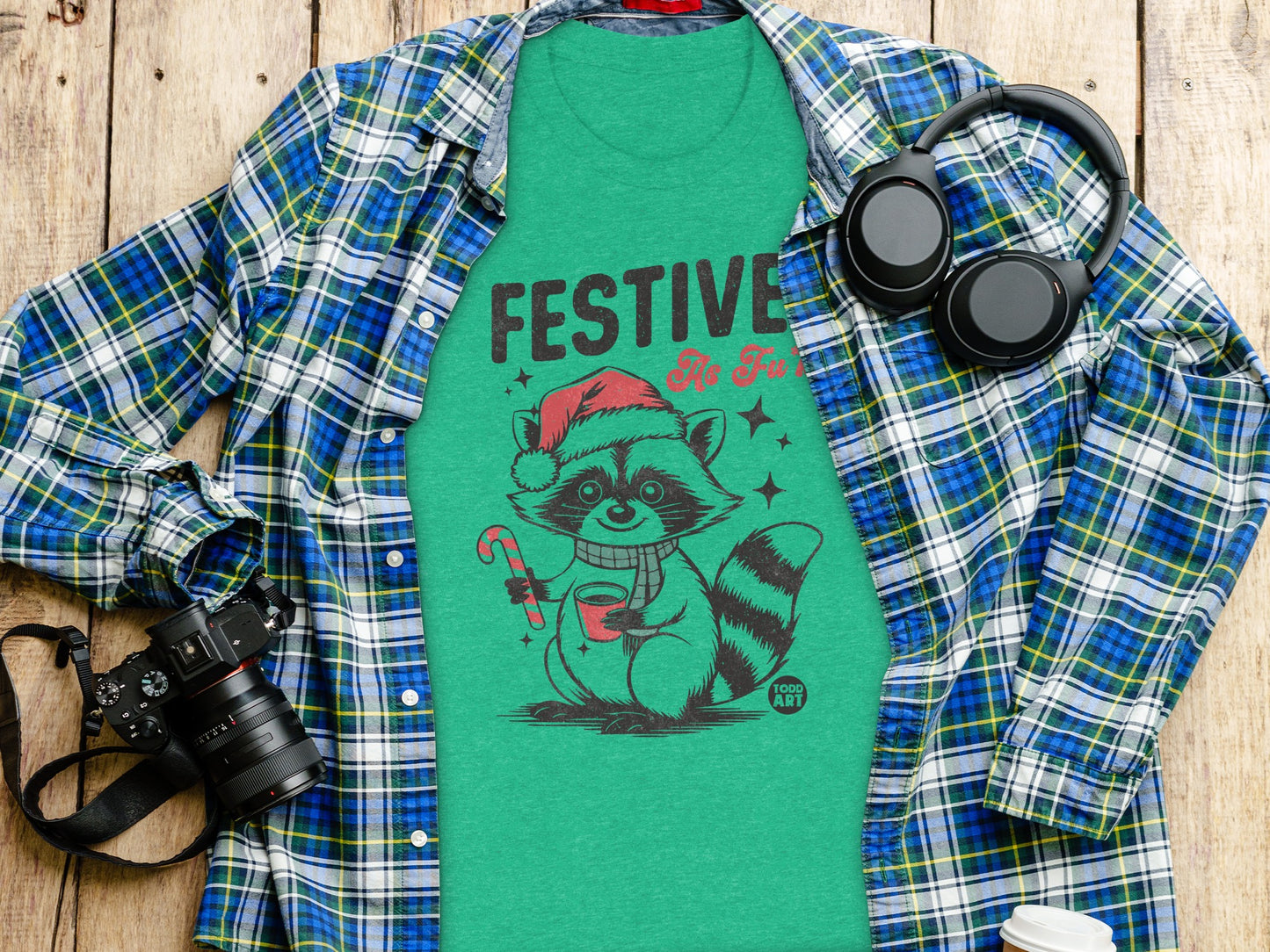 Festive Raccoon Holding Candy Cane Illustration T-shirt